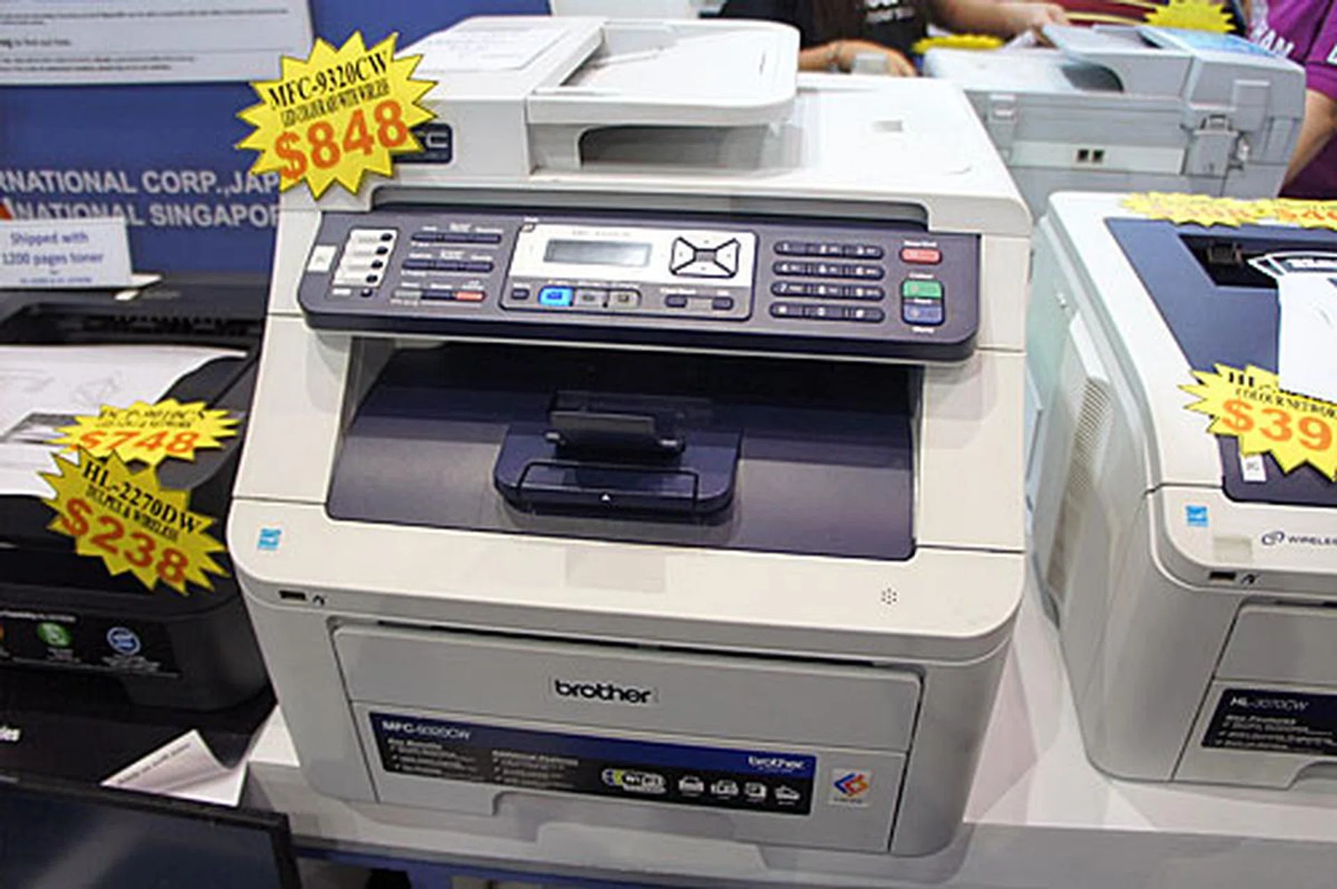 The MFC-9320CW is a color laser multifunction center (print/fax/copy/scan/PC fax/internet fax) with print speed of up to 16ppm (both mono and color). It’s going for $848 (usual price is $948) and comes with a free Fujifilm camera.
