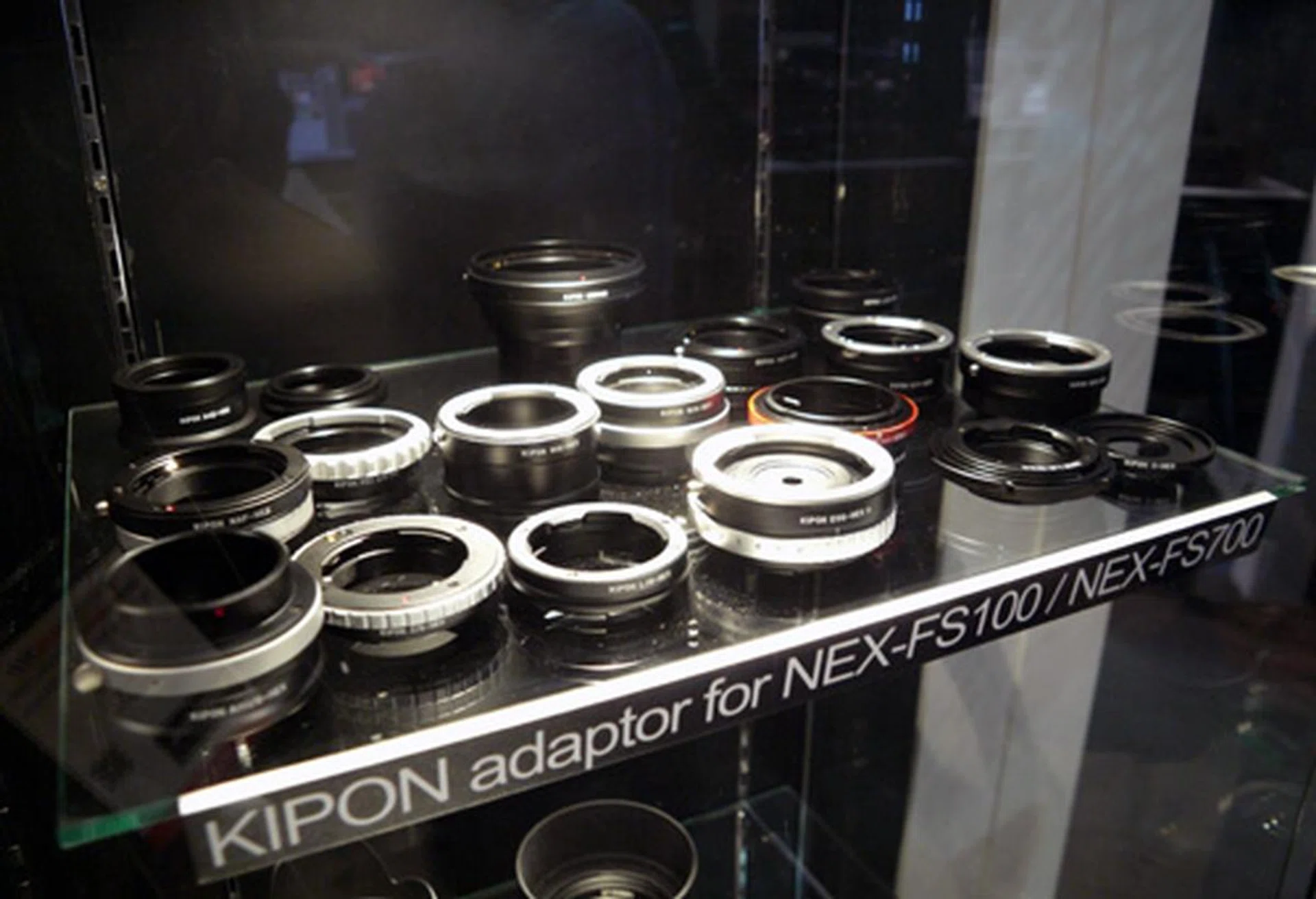 Adapters such as these from Kipon are fully compatible with Sony's FS700 and the older FS100 as well. 