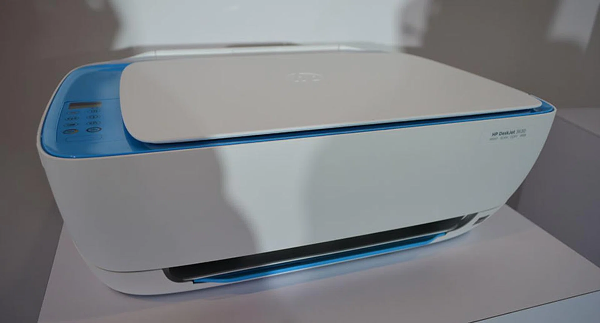 The HP DeskJet 3630 AIO printer features colored accents that draw the user's attention to key touch areas where they can interact with the printer.