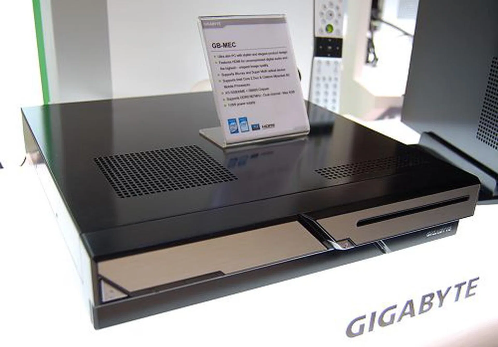  While the above entertainment PCs are designed around their existing micro-ATX motherboards, here's an ultra slim multimedia PC based on a proprietary board to achieve its smaller form factor. Uses an ATI RS600ME + SB600 platform, Intel Core 2 Duo or Celeron M processor, two DIMMs for 4GB of memory, integrated Radeon X1300 class GPU, one PCI expansion slot, Gigabit Ethernet, HD Audio, card reader, one internal HDD and one slim ODD (either a Super Multi DVD or a Blu-ray drive). The entire unit is powered by a built-in 110W PSU. And yes, it has HDMI output among other expected connectors like DVI-D, VGA, S/PDIF and USB.  