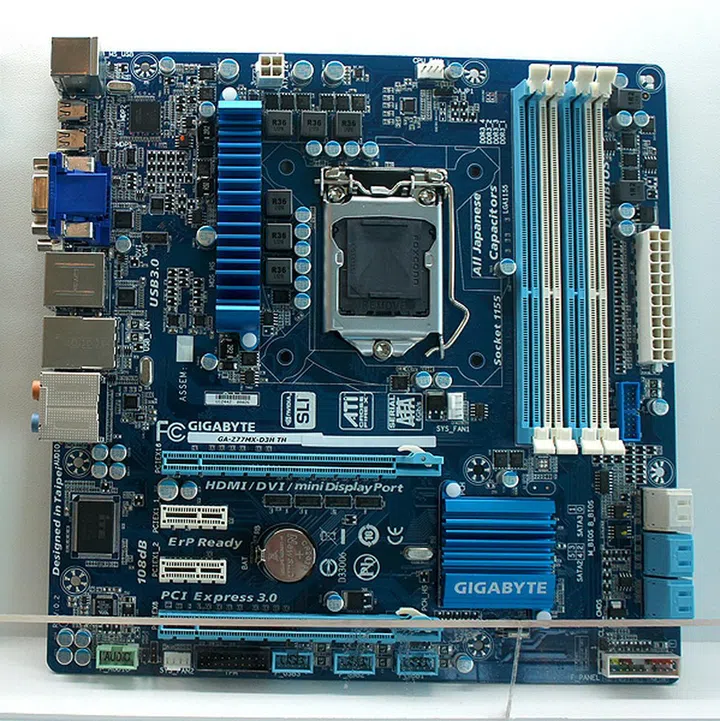 The GA-Z77-D3H TH
(In case you are wondering, that grey line near the bottom of the image is actually a piece of glass from the display stand.)