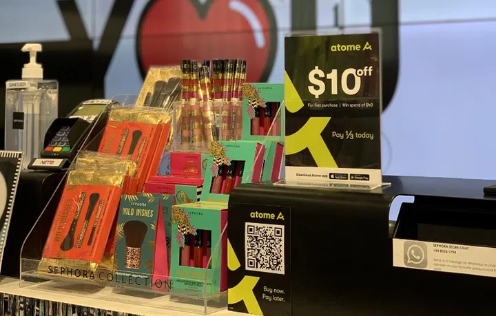 Customers can use Atome services at stores showing this sign. Image courtesy of Atome. 