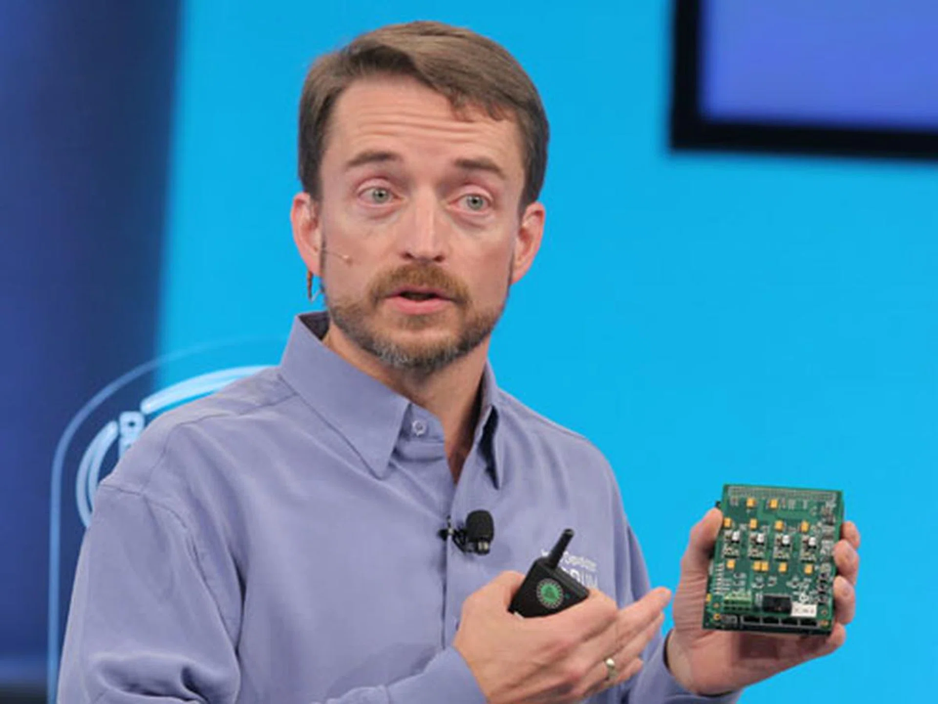 Intel senior vice president and general manager of the Digital Enterprise Group shows a running prototype of an L3 NIC, which is a prototype FPGA which Intel will make available to developers through their partners Altera and Xilinx.