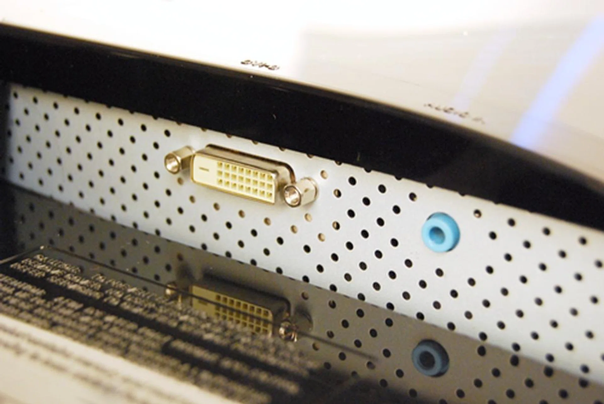 DVI-D and Audio (In/Out) ports at the back as per normal...