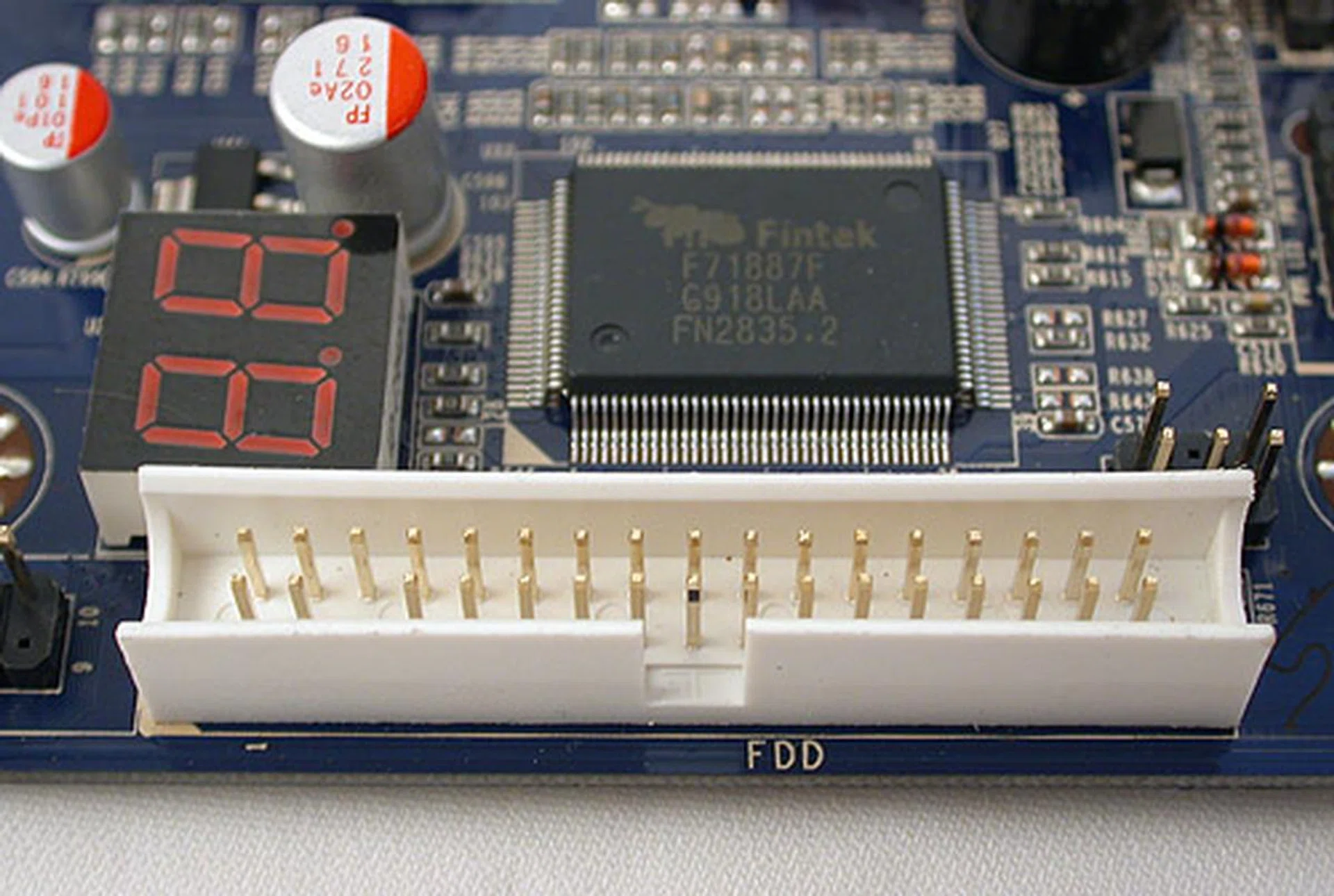 Trying to cover all the bases here, Jetway includes a floppy drive connector and a debugging LED. 