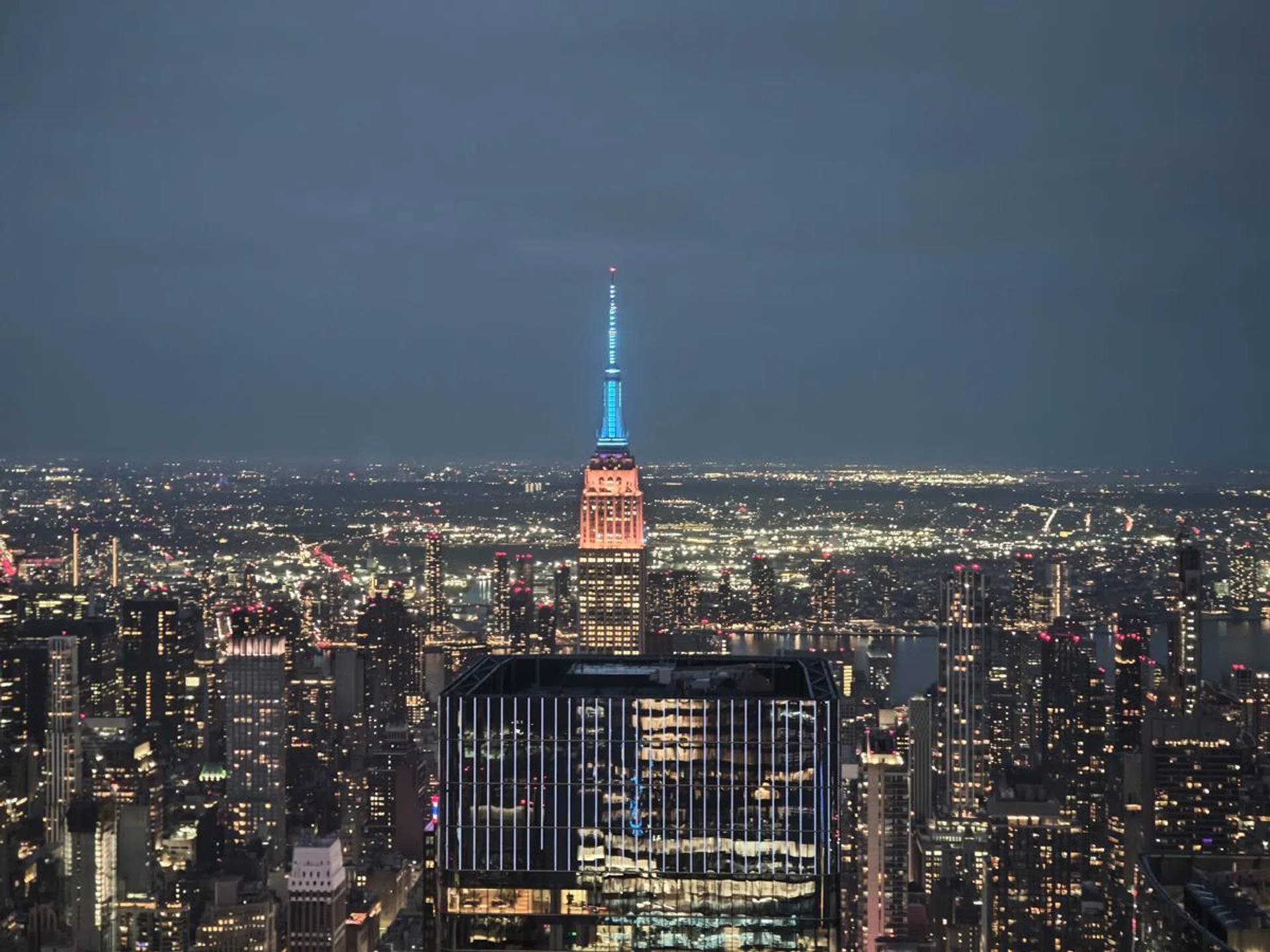 x2.6 or 60mm equivalent telephoto lens, at night