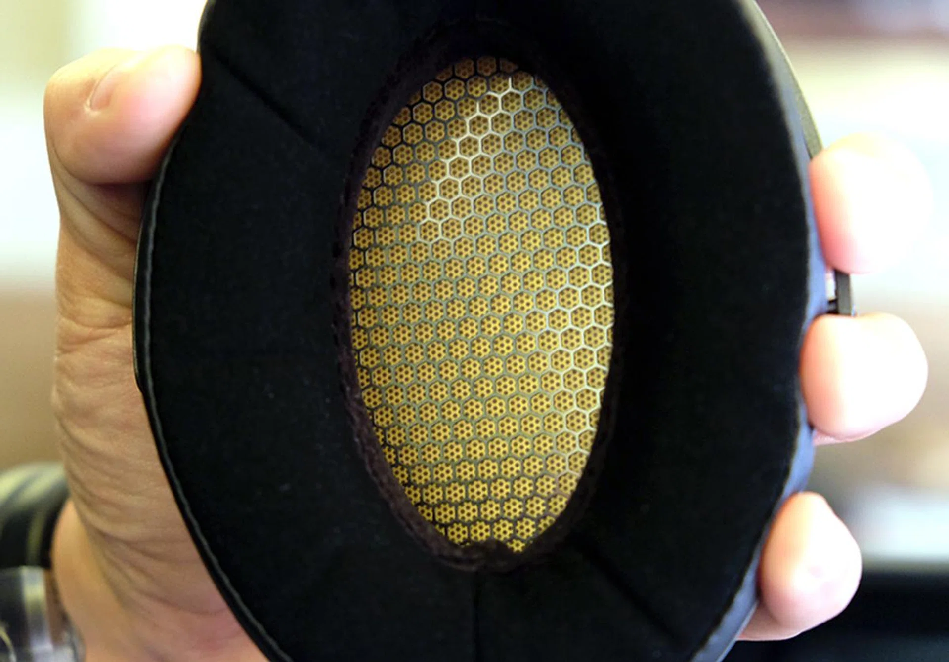 The platinum-coated diaphragm resides within. The ear cups are super plush.