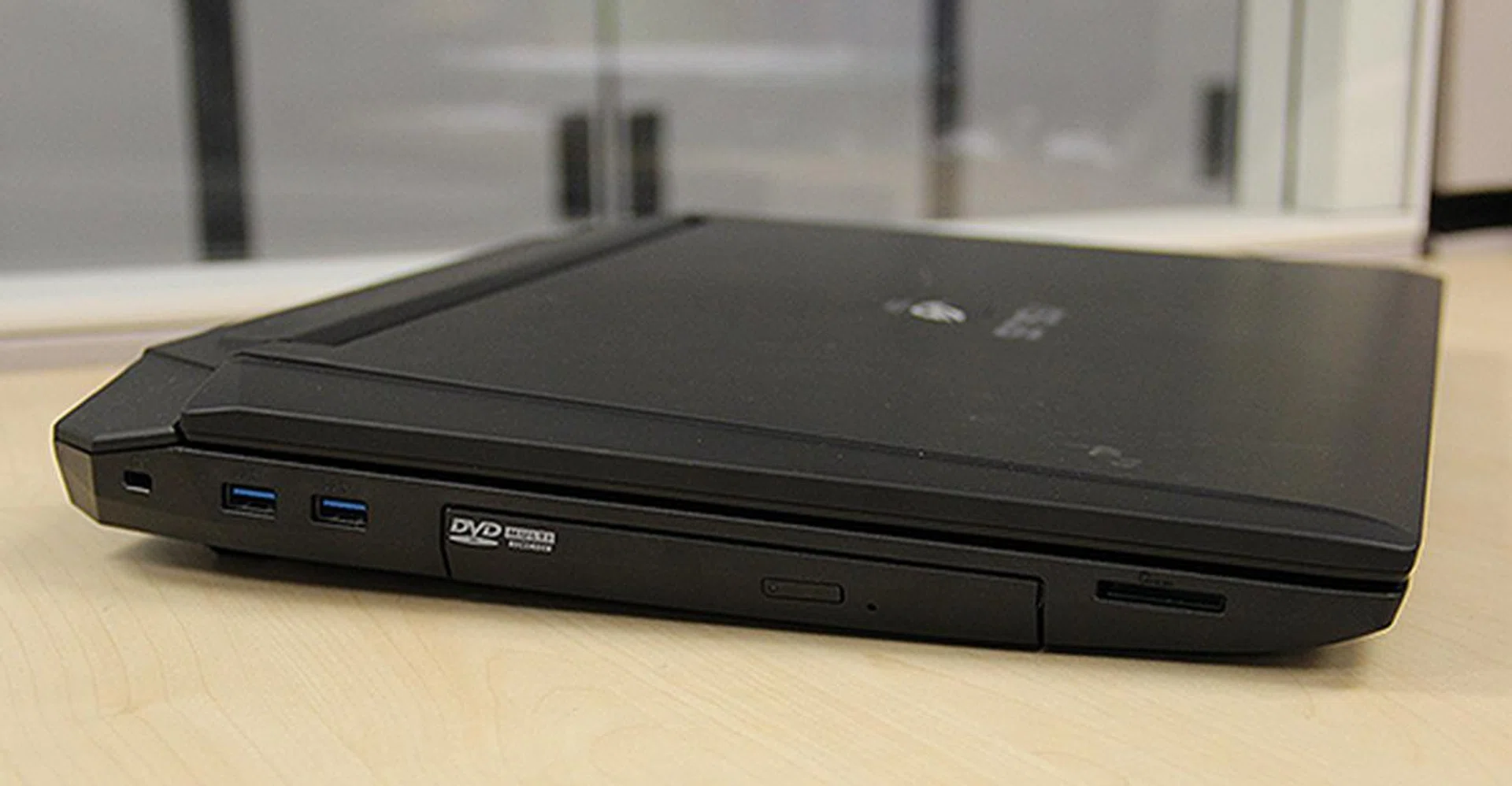 On the left are two USB 3.0 ports, a Super Multi DVD drive and a memory card reader.