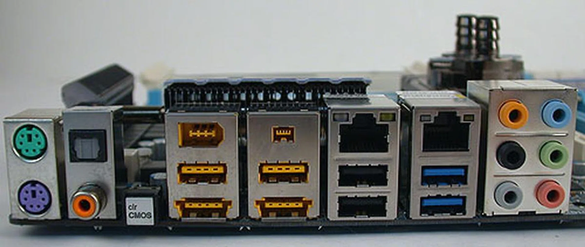 The Clear CMOS button here is really a bit larger than we deem safe. Gigabyte has included quite a generous number of ports, even eSATA/USB combo ports along with the USB 3.0 ones (blue).