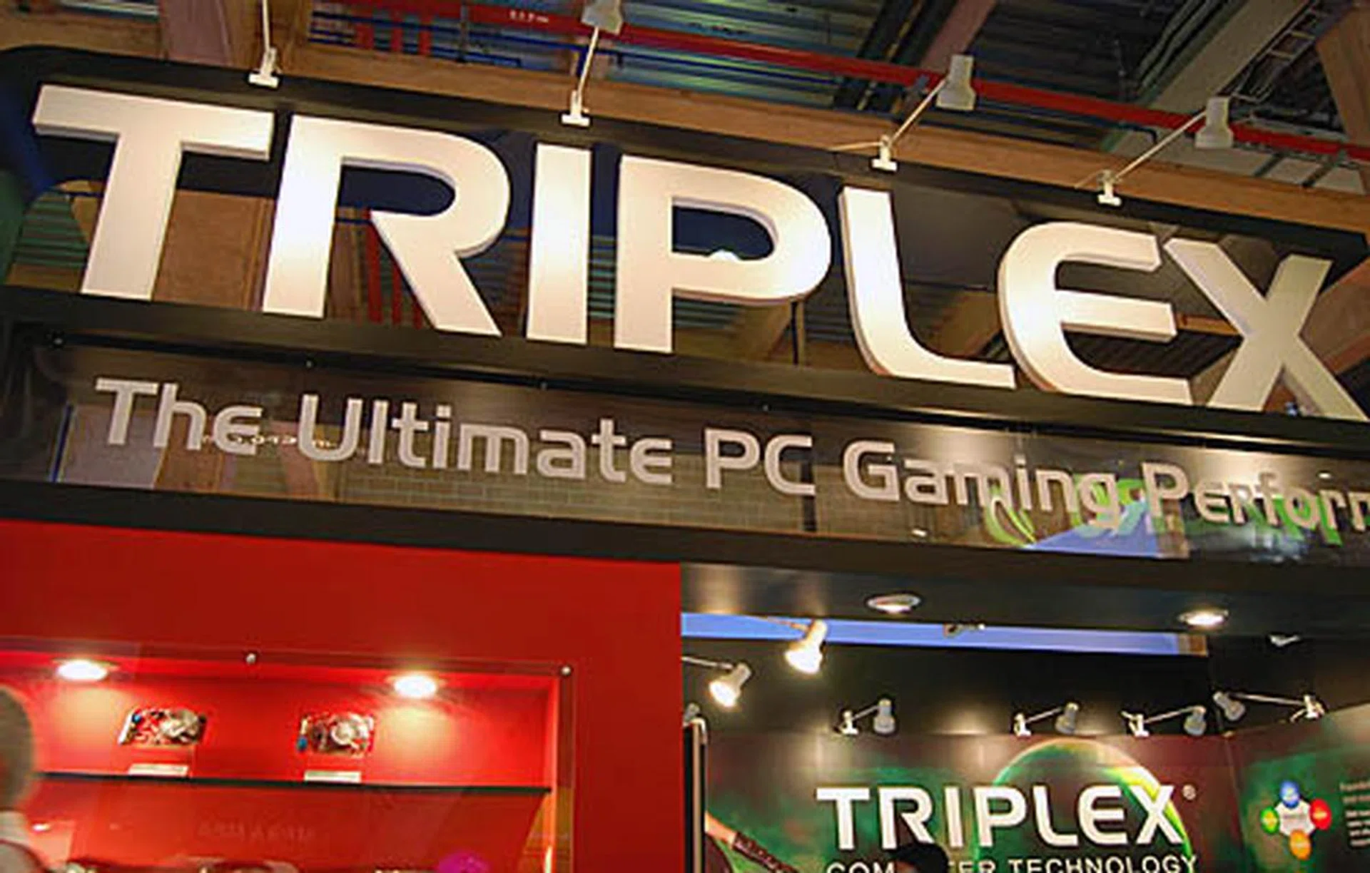  Triplex's modest booth is where you should drop by if ATI graphics card is your fancy, as you'll get to see the latest Radeon HD series.  