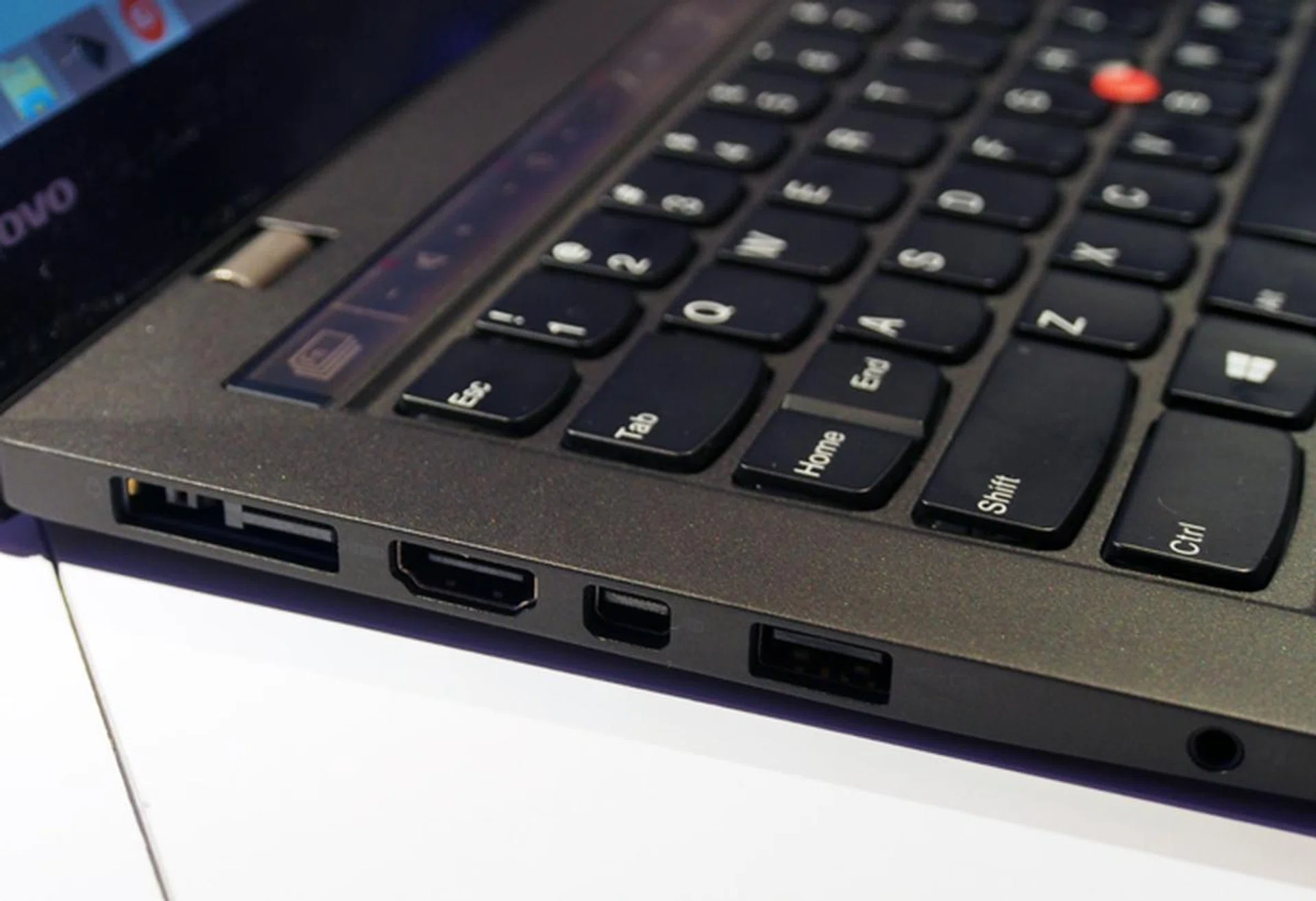 Most of the X1 Carbon's ports are found on the left-side. Another USB port and the proprietary hardwired Ethernet port can be found on the right-side