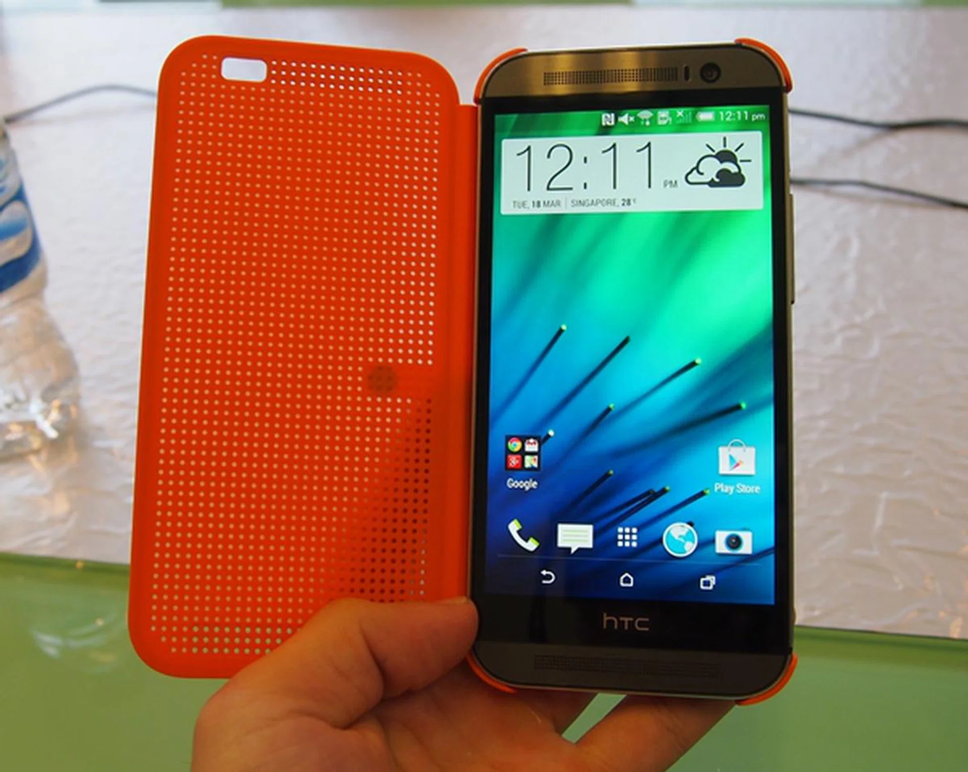 The Dot View Case has a sleep/wake function; flipping the case opens will turn on the display and vice versa.