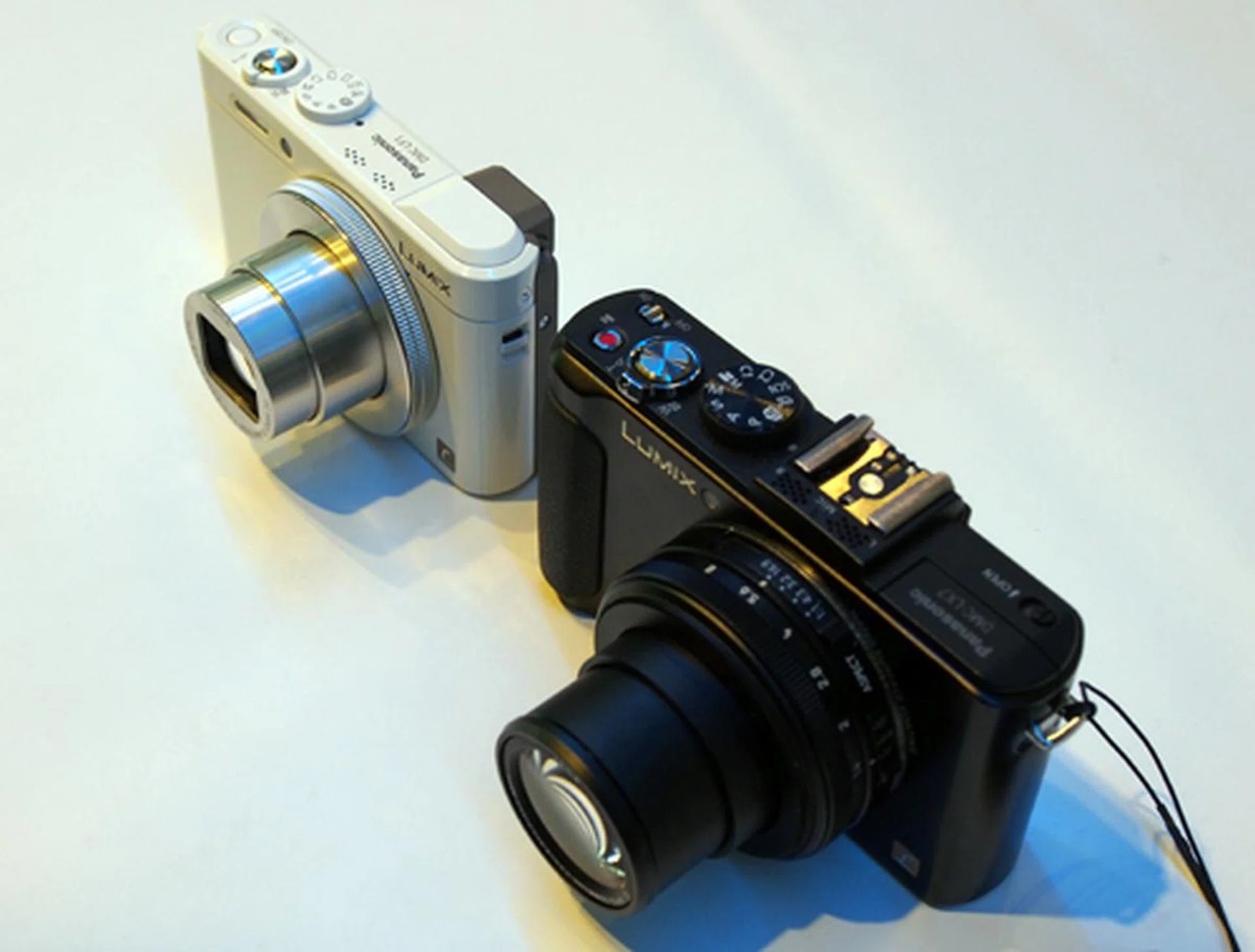 The LF1 is slightly smaller in both width and height when compared to the LX7. There's also no hot shoe mount on the LF1.