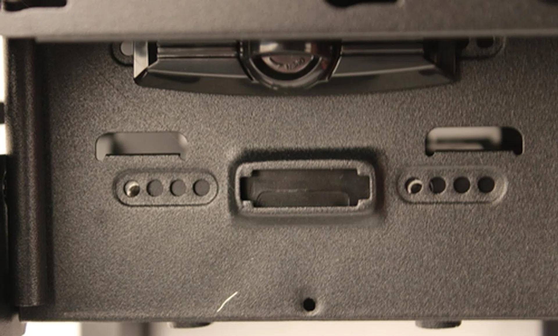 Making sure the screw holes of our 3.5-inch drive (such as the good old floppy drive) are lined up properly with those of the drive bay.