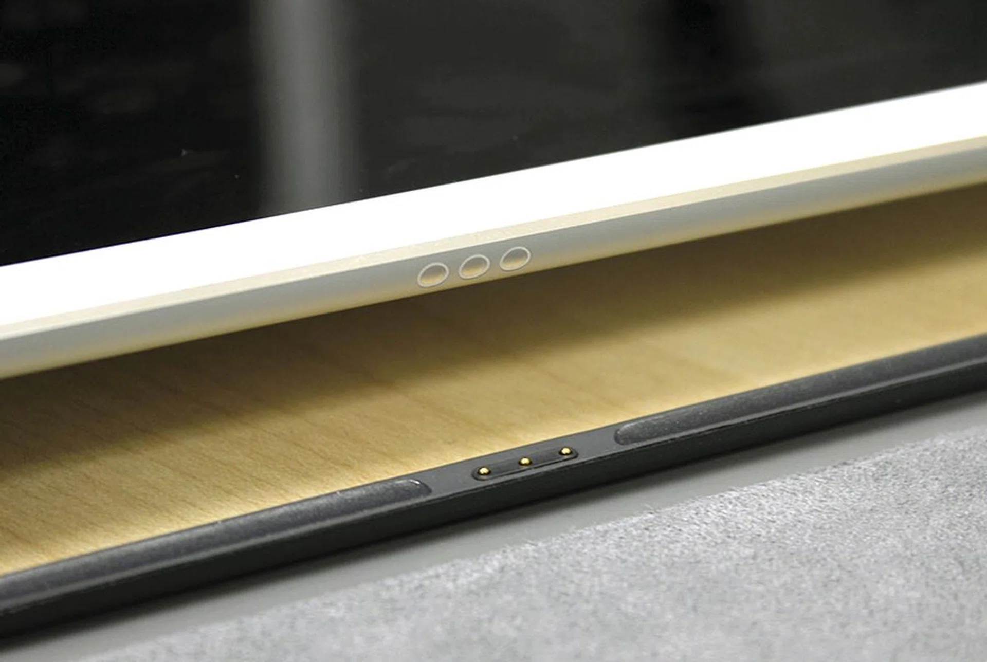 The Smart Keyboard connects magnetically to the iPad Pro and draws power from it via the Smart Connector.