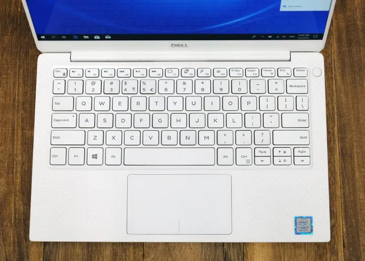 With thin bezels come tiny trackpads.