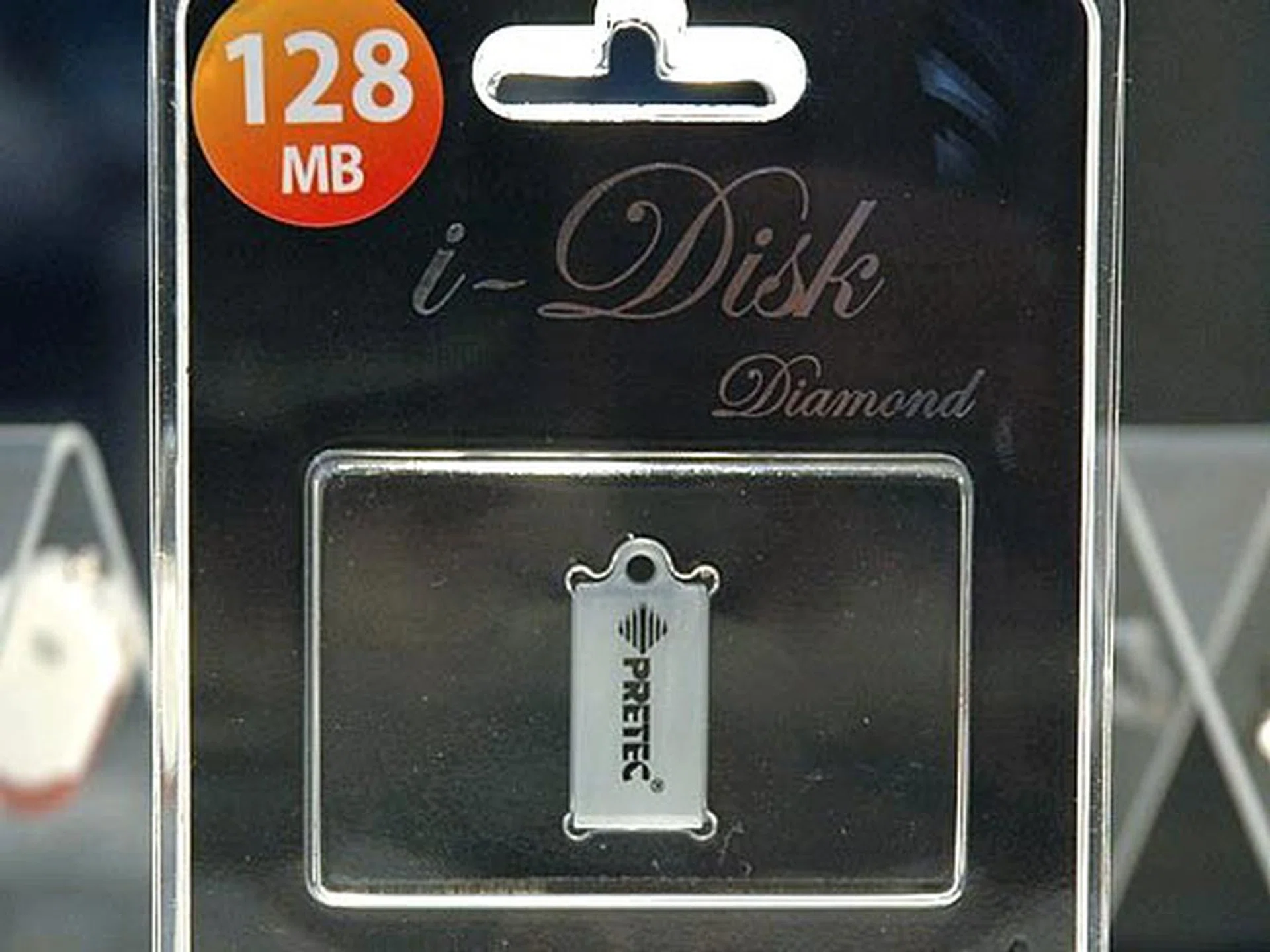 The i-Disk Diamond is the world's smallest USB drive with capacities up to 1GB and it fits into key chains or other wearable accessories.