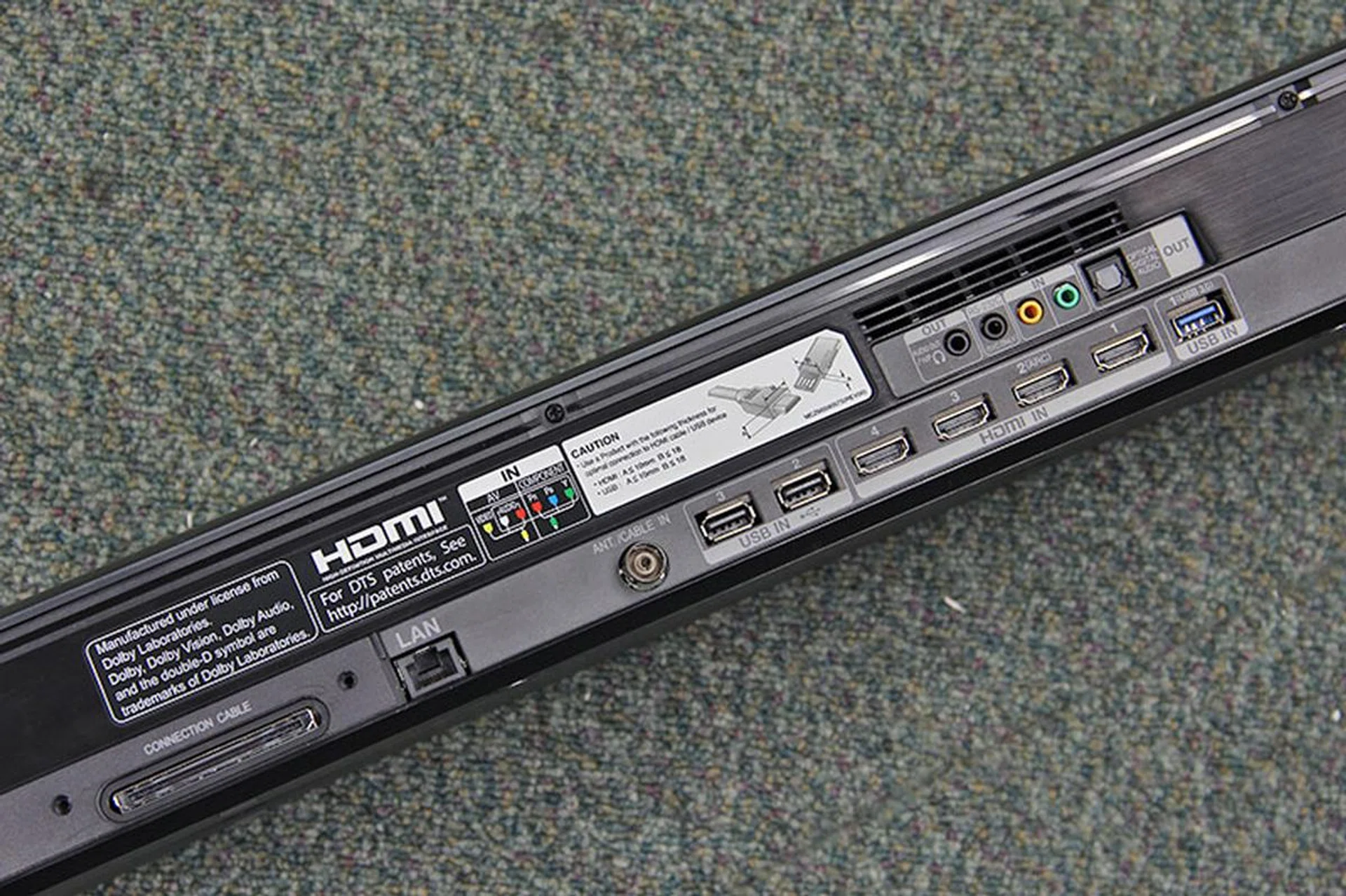 Here are the ports behind the heavy, do-it-all W7T sound bar. LG didn't exactly say, but since the TV supports HLG HDR, the HDMI ports should adhere to the 2.0b standard.