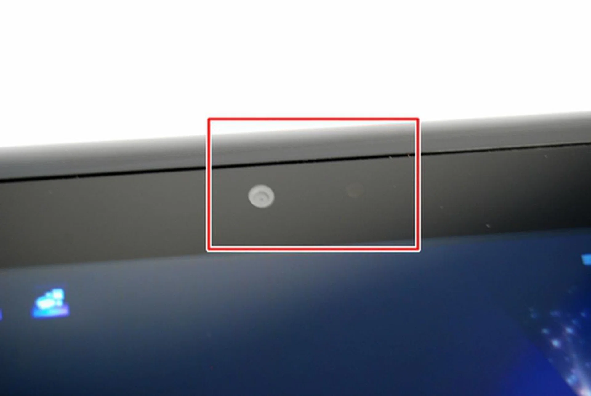 Located above the screen in the middle (landscape mode) are the 0.3-megapixel front camera (left) and ambient light sensor (right).