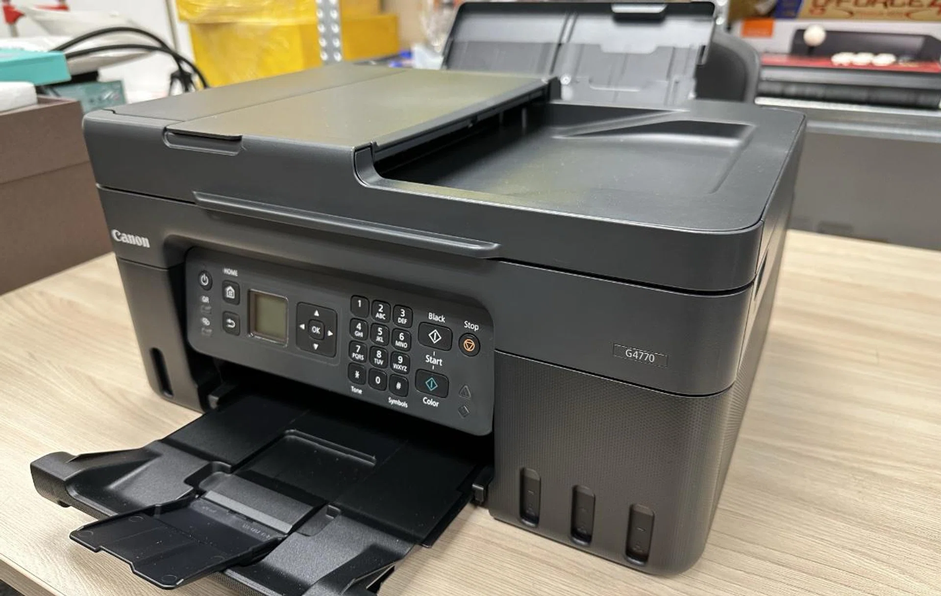 Annoyingly, the panel where the display is can't be articulated. Other than that, the printer works splendidly.