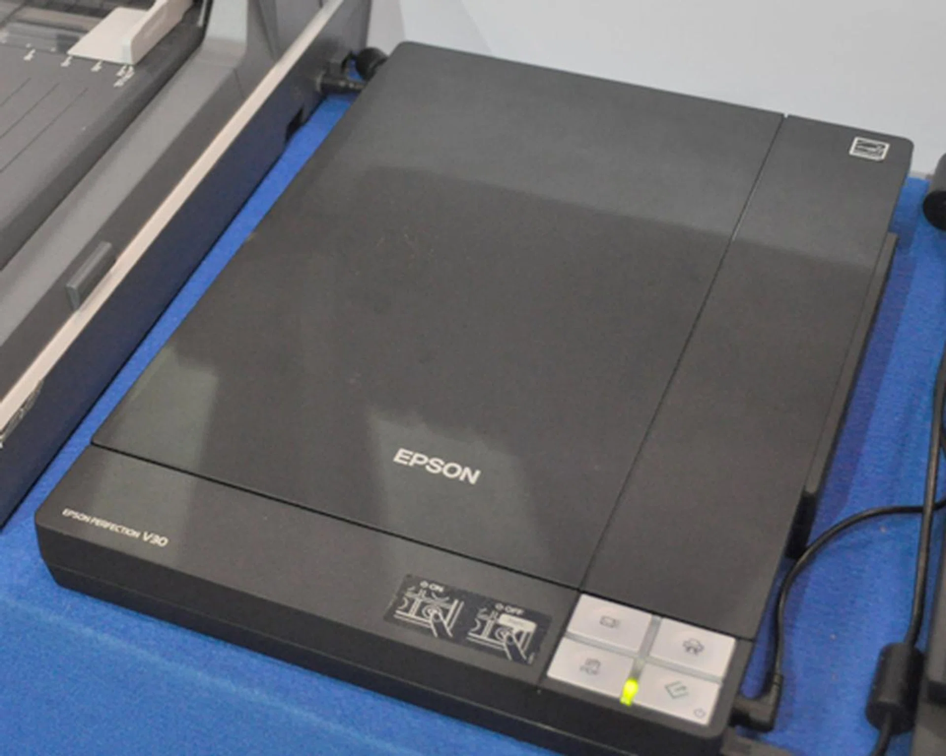 Scanners aren't going the way of the dodo yet, because it is practical. Such as the Epson Perfection V30 scanner. Some of its main features include a zero warm-up time with ReadyScan LED technology and can scan up to 4800dpi in resolution And, it's only $148.