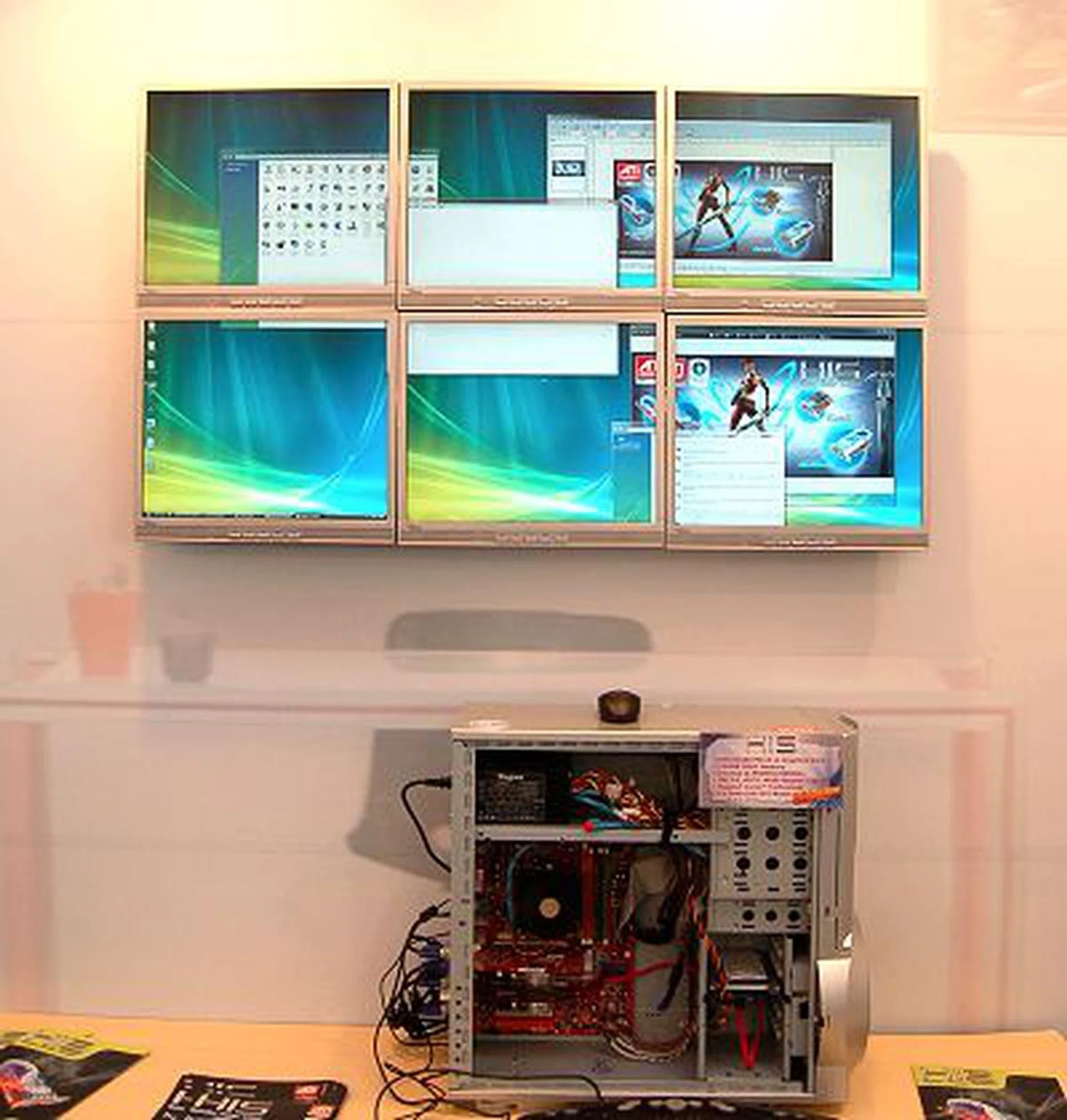  Using the PCIe x1 graphics card along with PCIe x16 and PCI versions of the same graphics card, HIS was demonstrating how inexpensive it is to go multi-screen without having multiple PCIe x16 slots since HIS has PCI and PCIe x1 solutions that many other vendors lack.  