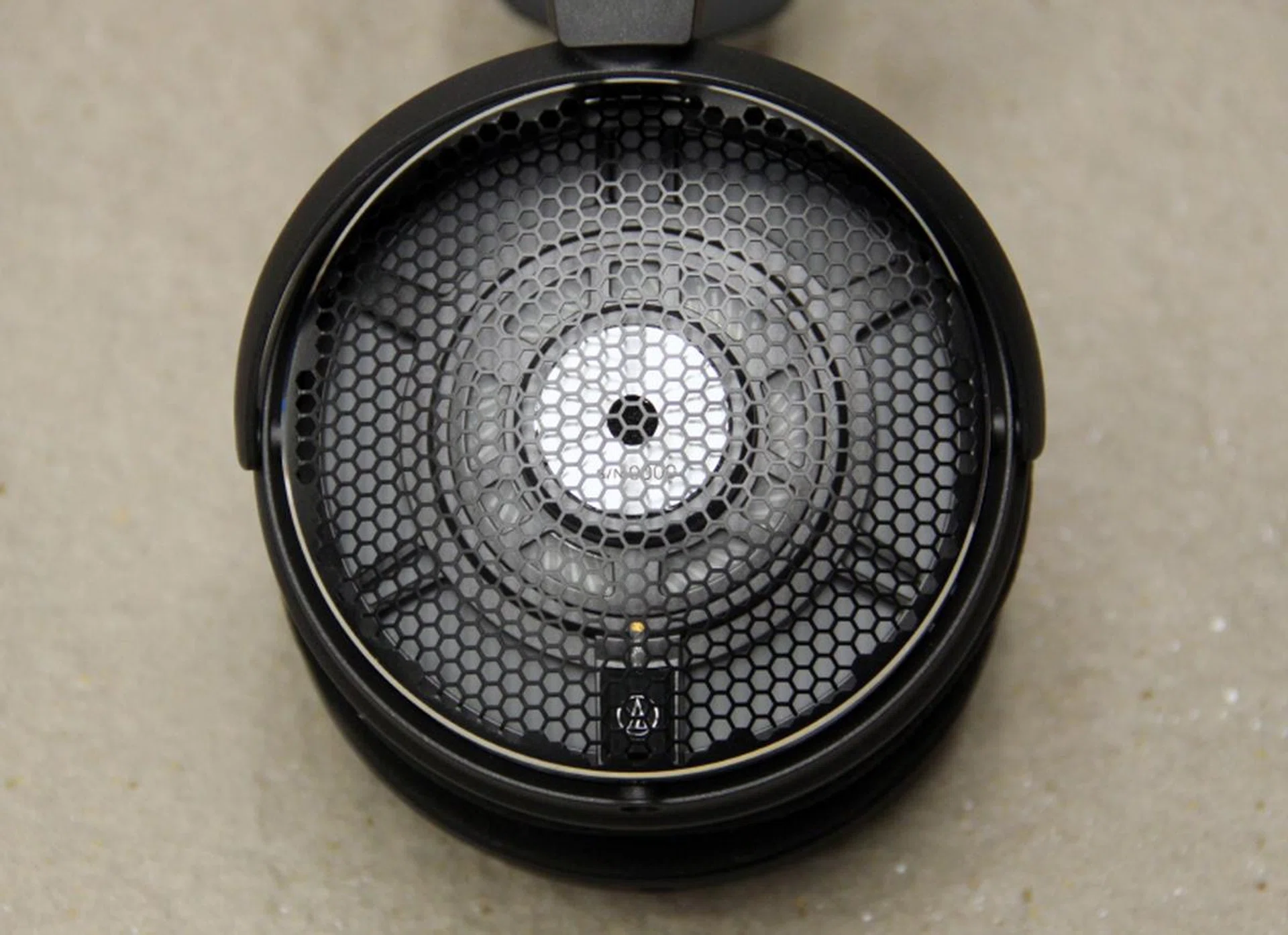 The driver and baffle are one single unit. Note also the laser-etched serial number that is behind every driver.