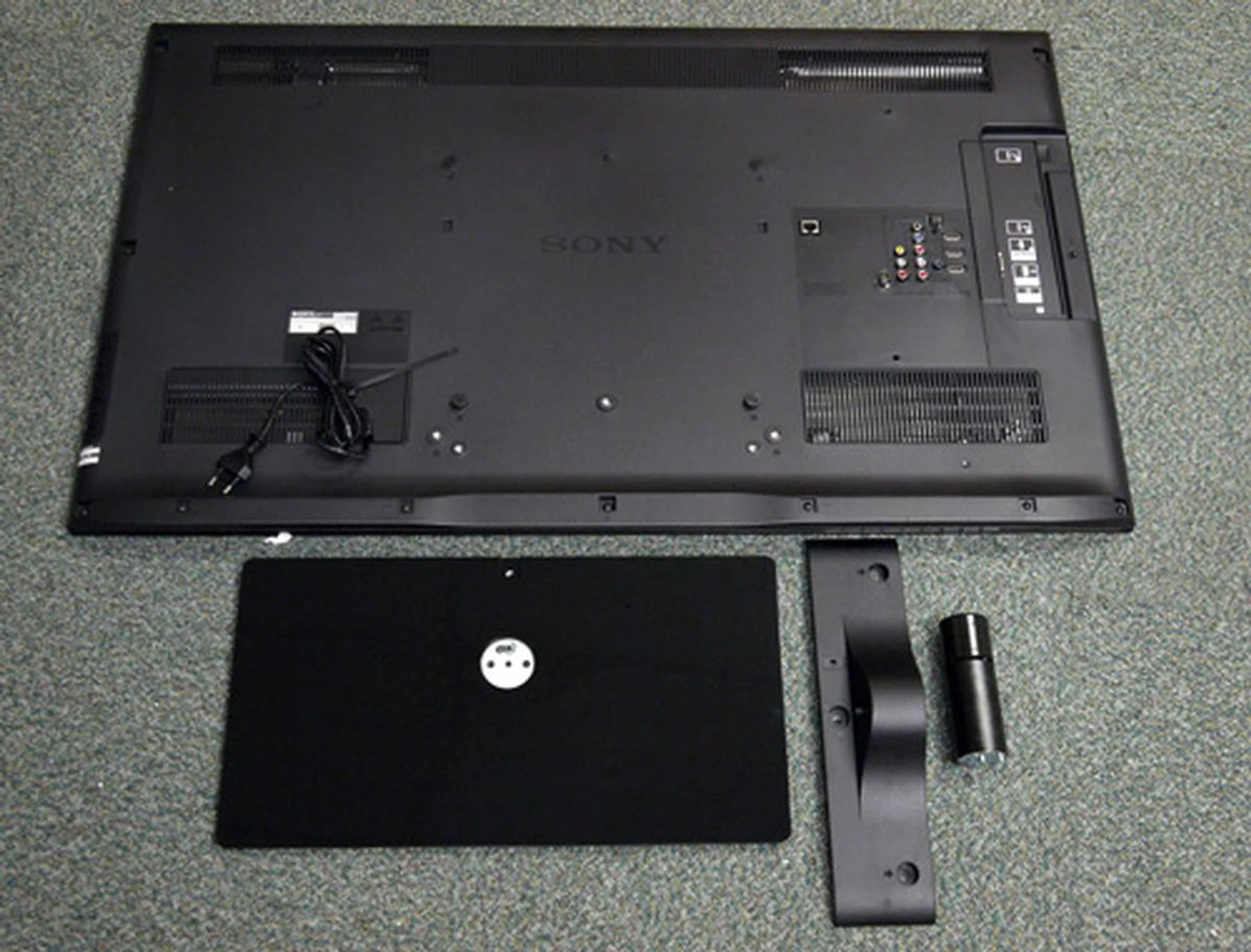 There are two large screws situated behind the panel which act as guide pins and should not be removed. Despite its implementation, the entire unit remained a tad wobbly after we were done with its assembly.