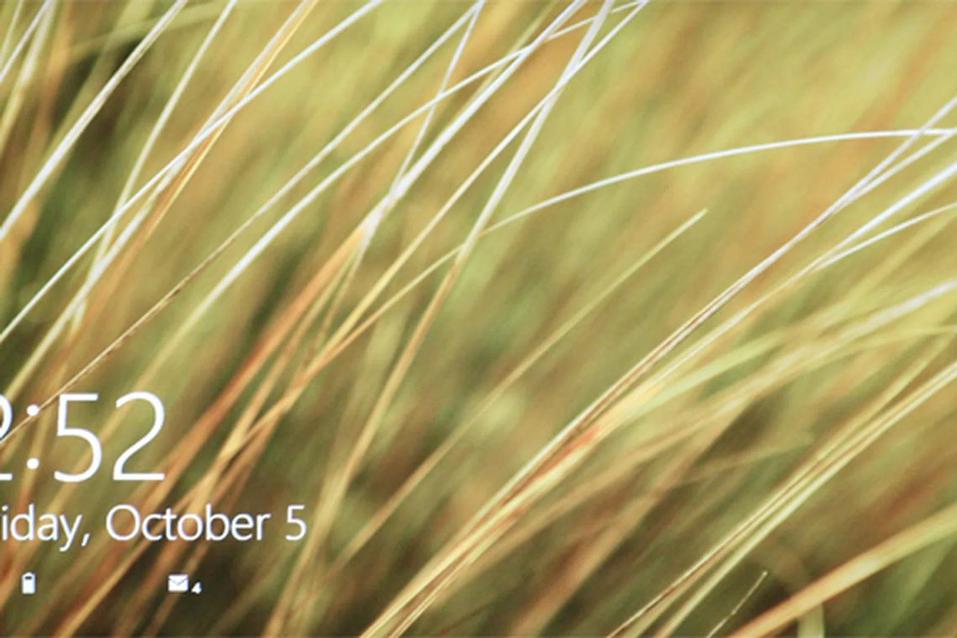 Place your finger anywhere on the screen, and slide upward to get past the lock screen. If you're using a mouse, just do a left click.