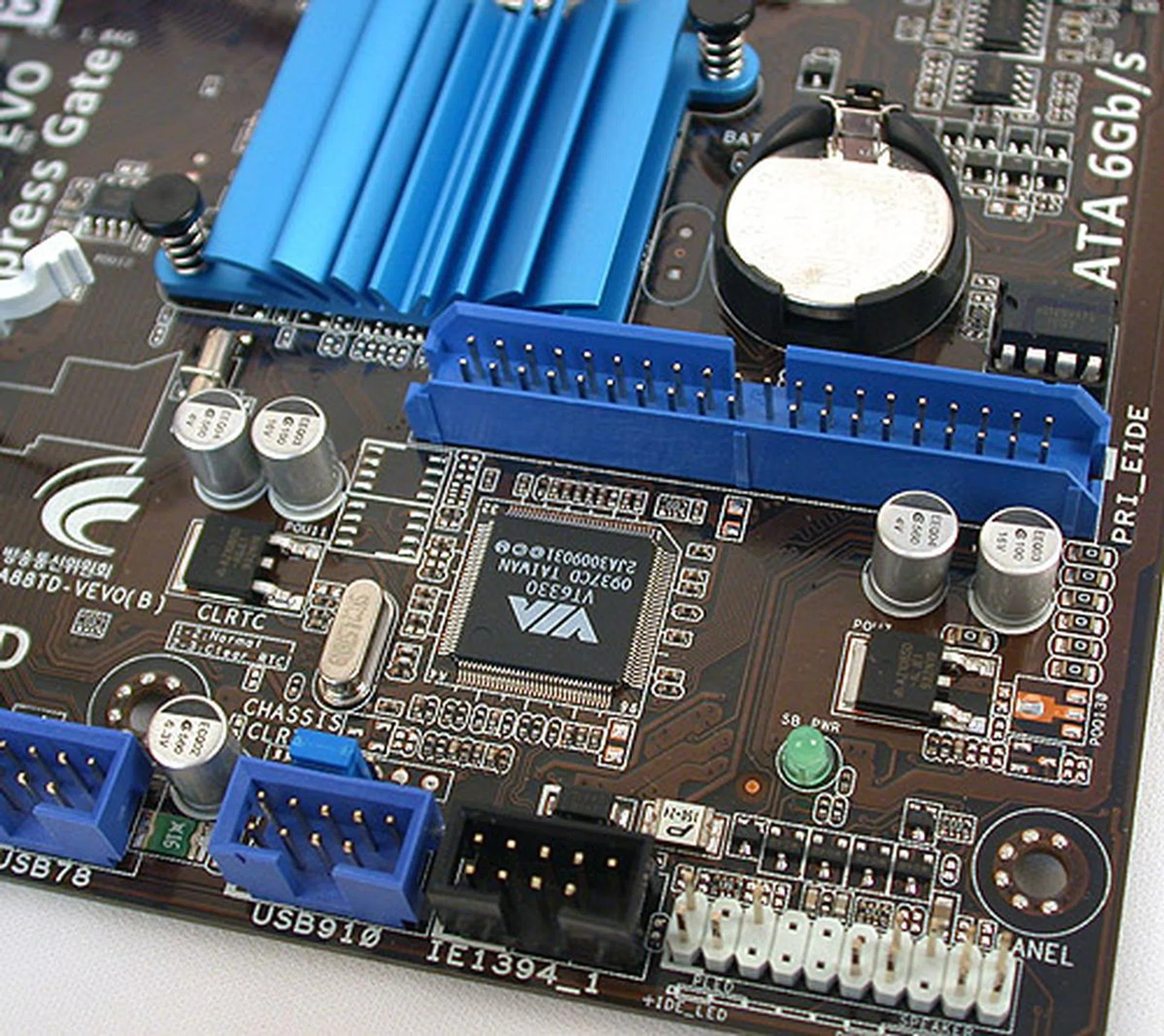 ASUS has included an IDE connector here and while it may look like a uncommon orientation and location to place the connector, ASUS manages to avoid clashing with dual-slot graphics cards. There could be a minor issue with the IDE cable though, as it has to be sufficiently long to loop over a dual-slot graphics card, which is the only way we think you might reach an IDE-based optical drive on your system.