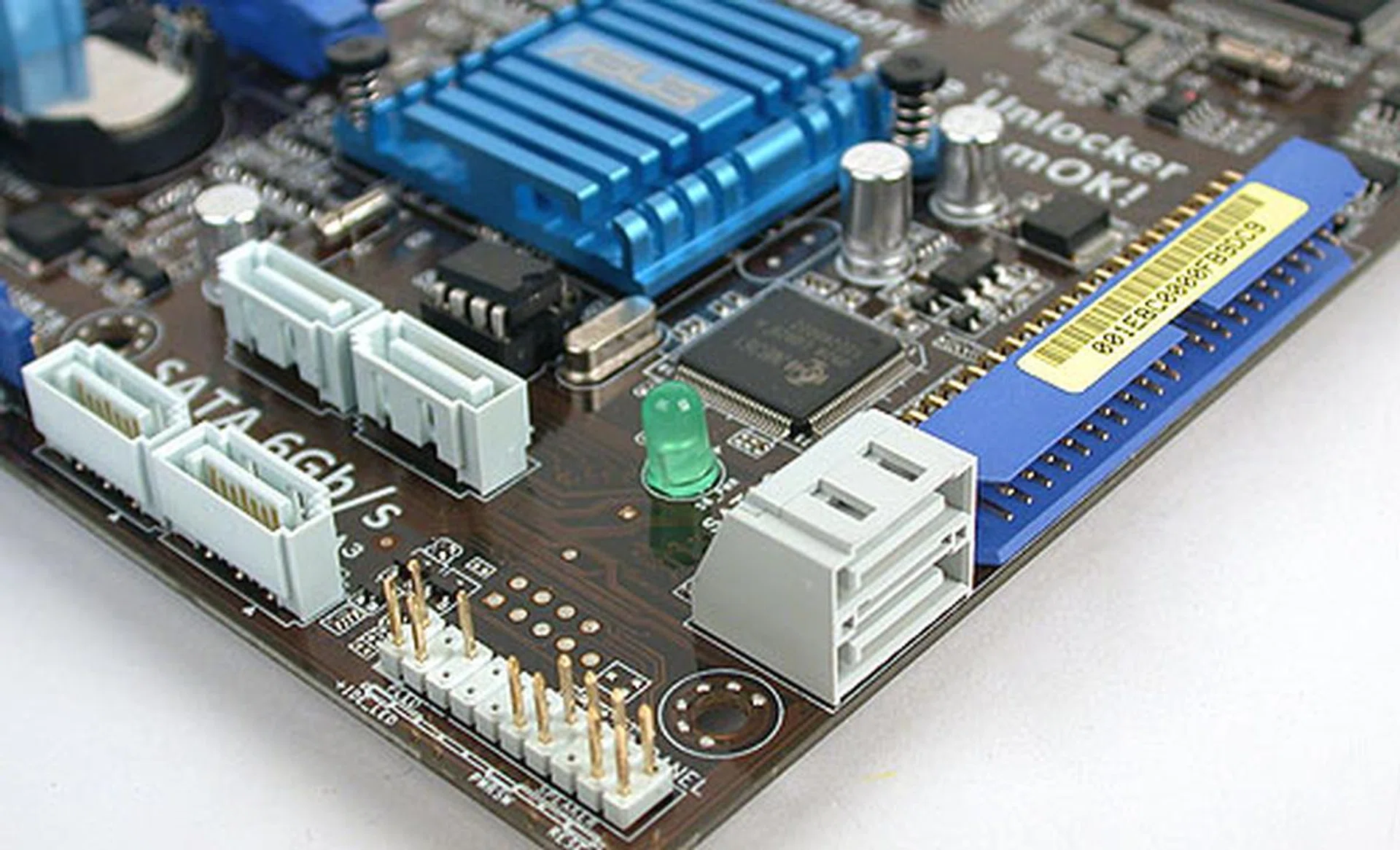 ASUS has split the SATA 6Gbit/s ports in an unusual arrangement presumably to minimize the chances of them interfering with your add-on cards. From what we can tell, the designers have succeeded. There's even an IDE connector for your older PATA devices.