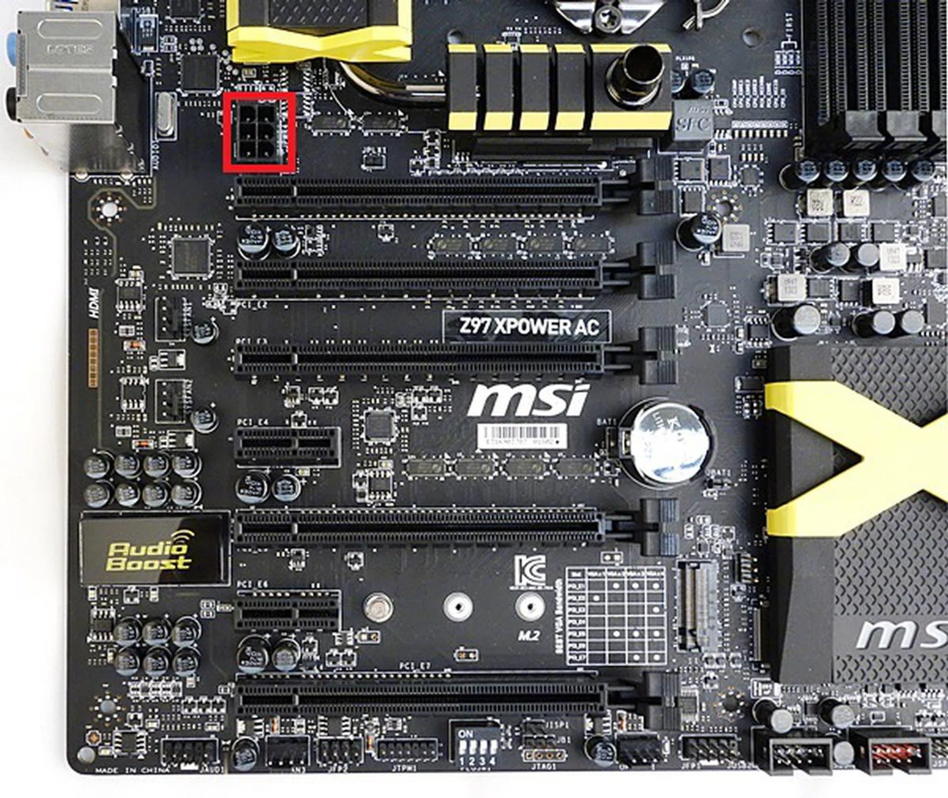 There is a 12V 6-pin ATX power connector (marked in with red frame) located near the first x16 slot; however, it isn't indicated if it provides additional power for a multi-GPU setup.