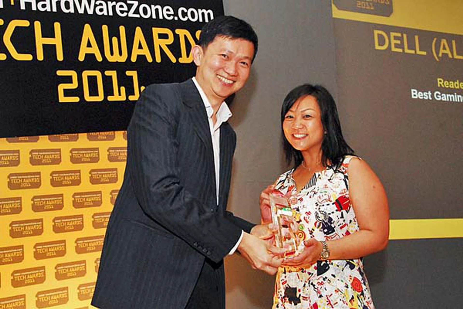 Dell's Alienware won the Reader's Choice for Best Gaming Notebook Brand. Here's Ms. Adeline Lee, Manager, Corporate Communications, Global CSMB, Dell Global Business Center Sdn. Bhd., accepting the award.