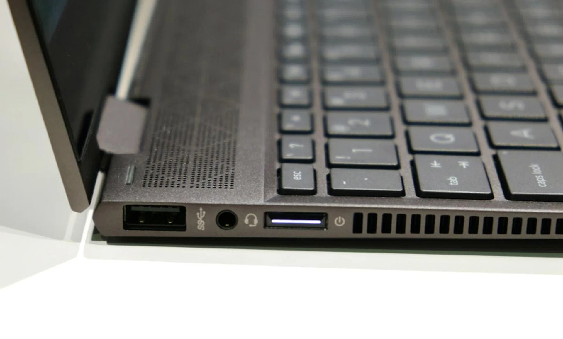 On the left of the Envy x360 13 is a single USB Type-A port and headphone jack. Out of the frame is the microSD card, which is located further right.