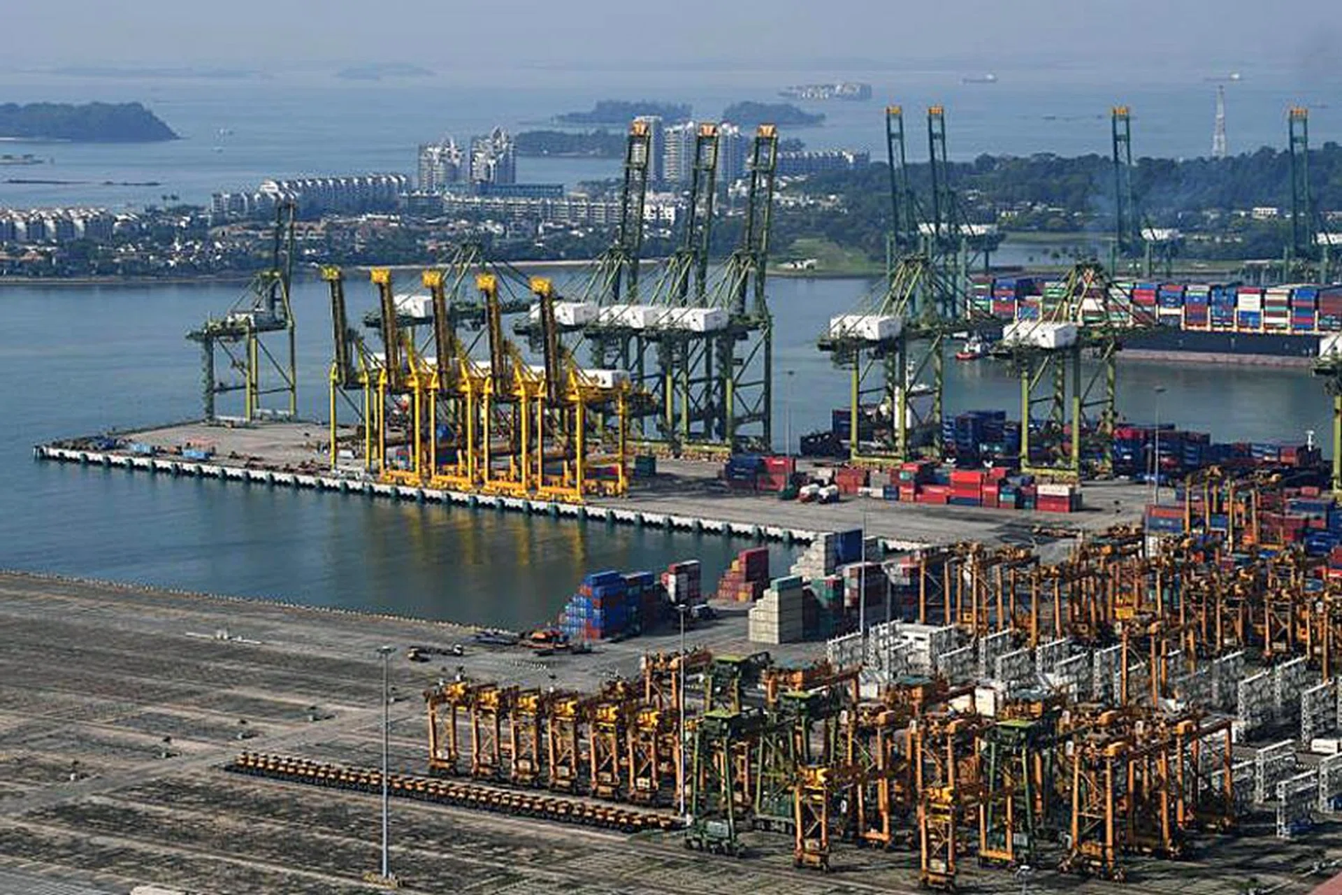One of the key uses of 5G here is in smart port management, where the operator can remotely control driverless cranes and trucks to load and unload containers, or remotely inspect machines using driverless drones. Photo: ST File