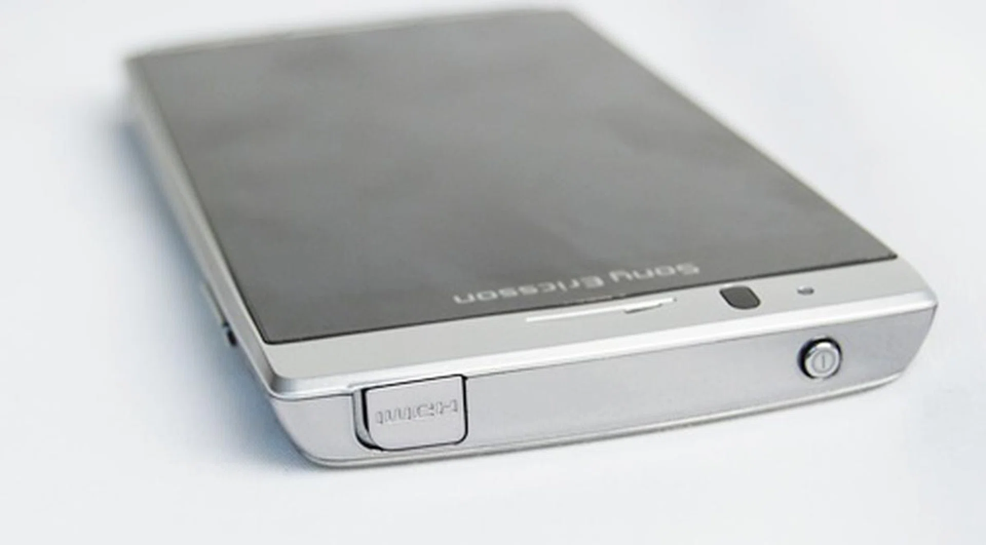 The phone also comes with a HDMI video output on the top that's protected by a small cap.  The power button sits on the other end  - tiny and flushed, we found it difficult to press and sometimes, locate.