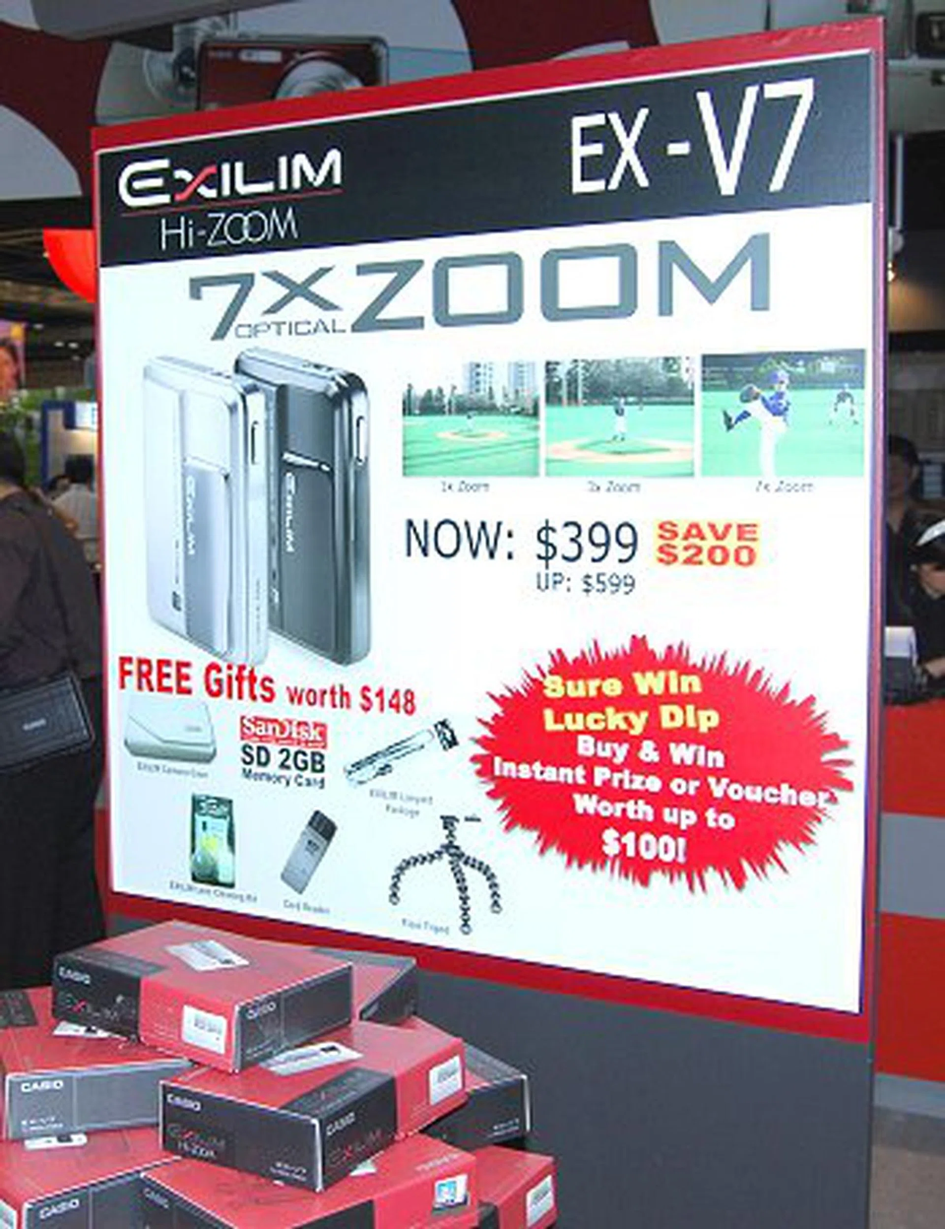  We believe a picture paints a thousand words, but for our readers' benefit, here's the deal with the Casio EXILIM EX-V7: Priced at S$399 (usual price: S$599), this 7.2-megapixel camera, with an optical zooming capability of up to 7X, would definitely reward you well with a sure-win lucky dip and free gifts worth up to S$148.  