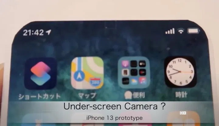 The iPhone 13 is seen with no notch on the front display. <br>Image source: Screenshot taken from Macotakara's YouTube video on "iPhone 2021/5.5 inch 3D プリントモックアップ"