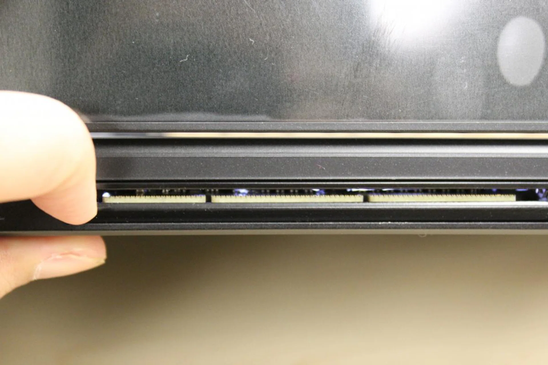 An up close look at the connector port. It's usually protected by a plastic cover, but we've raised it for this close-up shot.