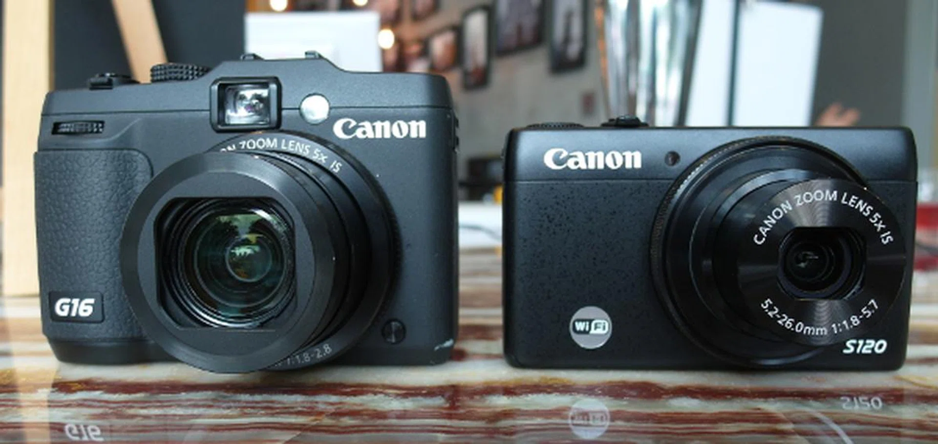 Due to the S120's (right) smaller size, we're expecting it to be favorable with the ladies targeting a competent compact camera with good performance to boot.