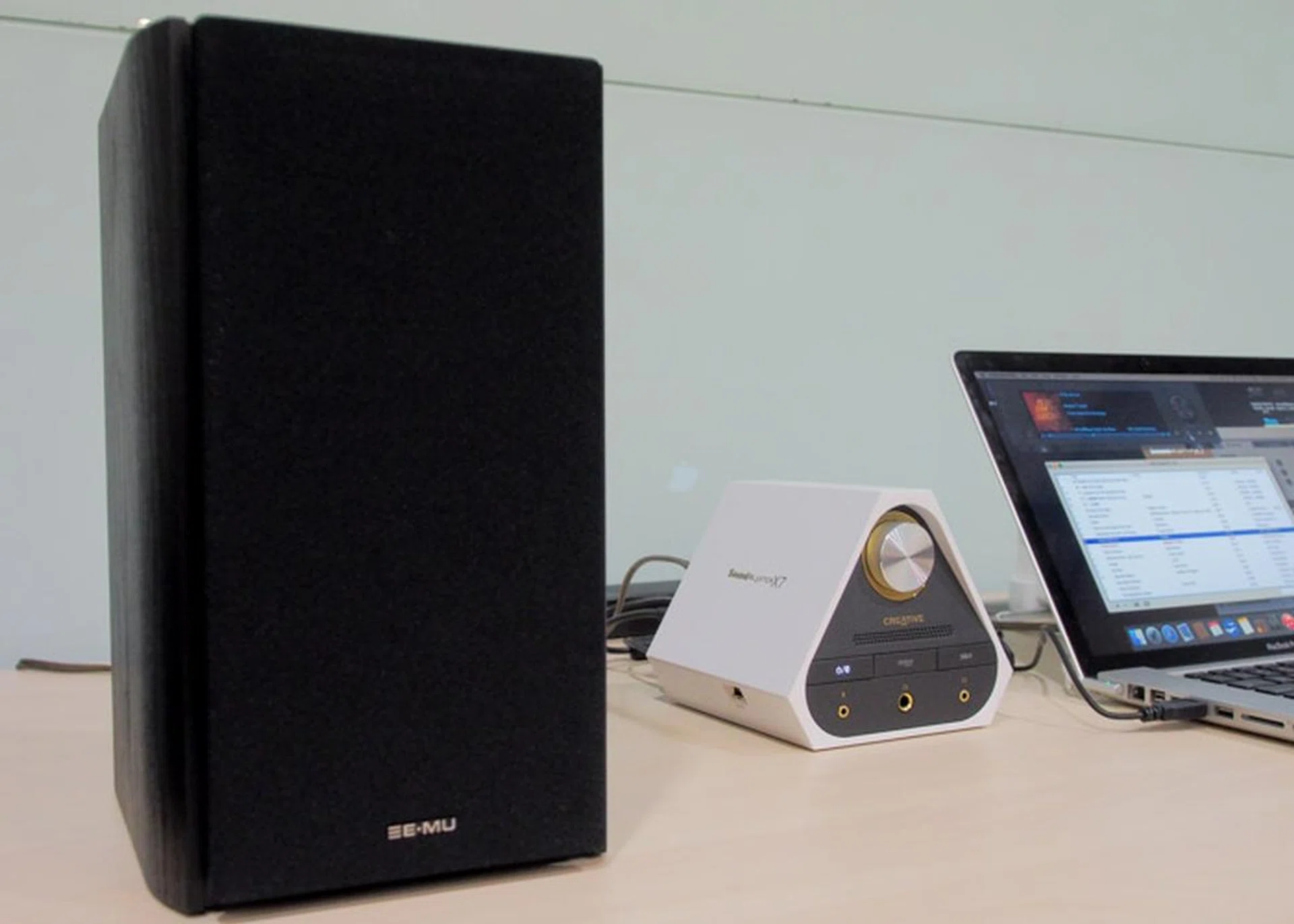 The E-MU XM7 in black with the speaker cover attached. 