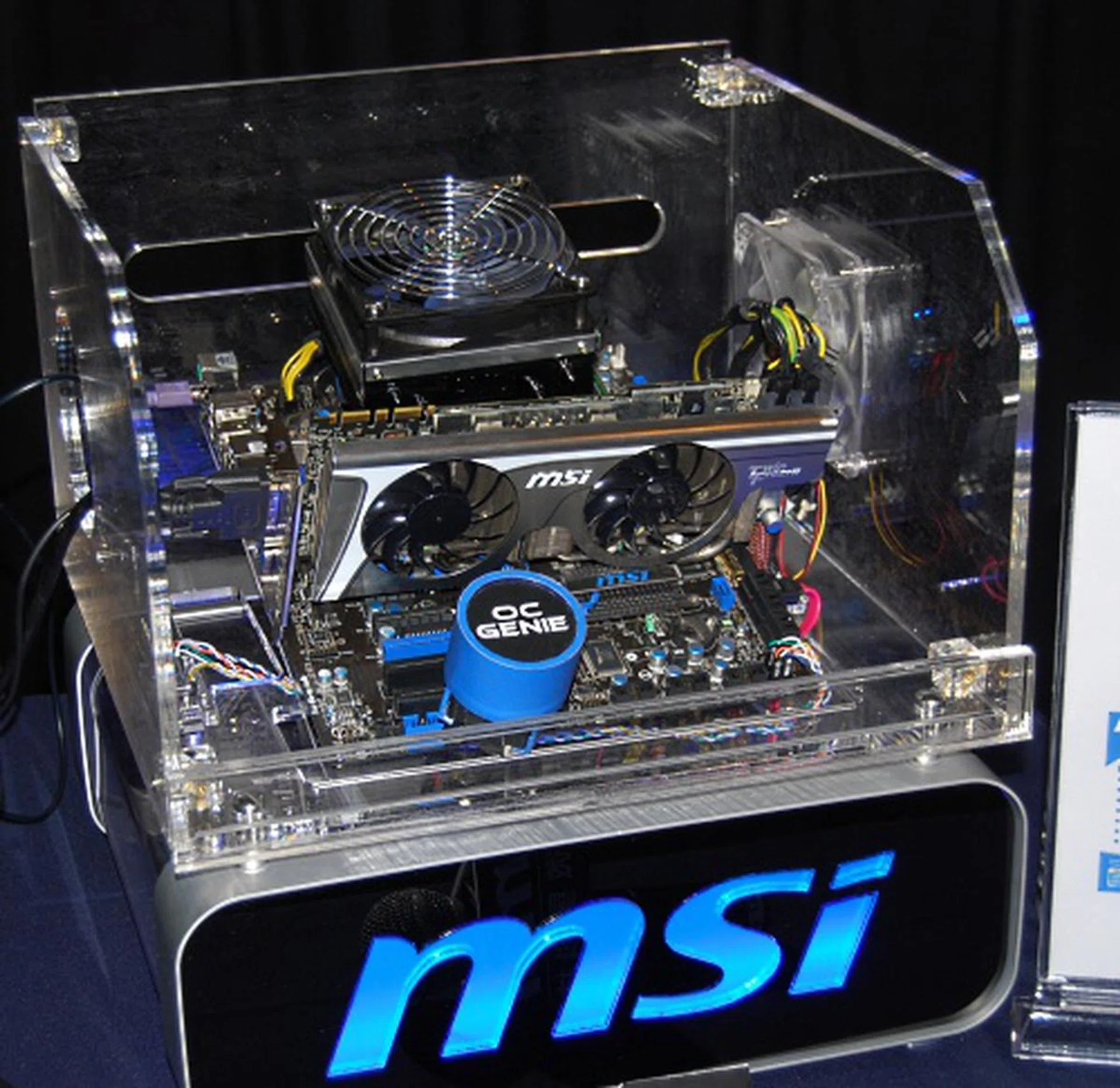 MSI's demo system for the presentation, a MSI P55-GD65 fitted with a Core i7-870 and a impressively huge CPU cooler. Don't worry, the giant OC Genie button here is for illustration, the actual button is of course much smaller.