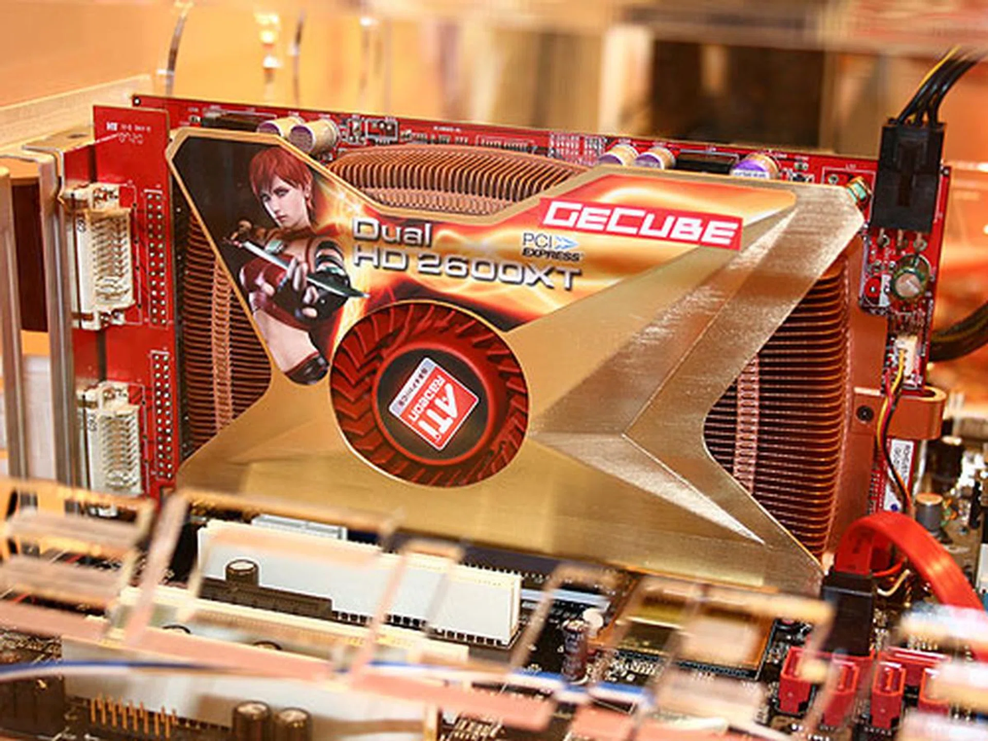  GeCube will also be offering a dual Radeon 2600XT card which will be a single card with two Radeon 2600XT VPUs in CrossFire mode. It will come with 1GB of memory (512MB each). Its core will be clocked at 800MHz while its memory (128-bit DDR2) will run at only 1GHz. What's cool about this card is that it will support up to four DVI outputs without any messy dongles. It's a proper two-slot solution and gone is the noise pollution of the previous Gemini series.  