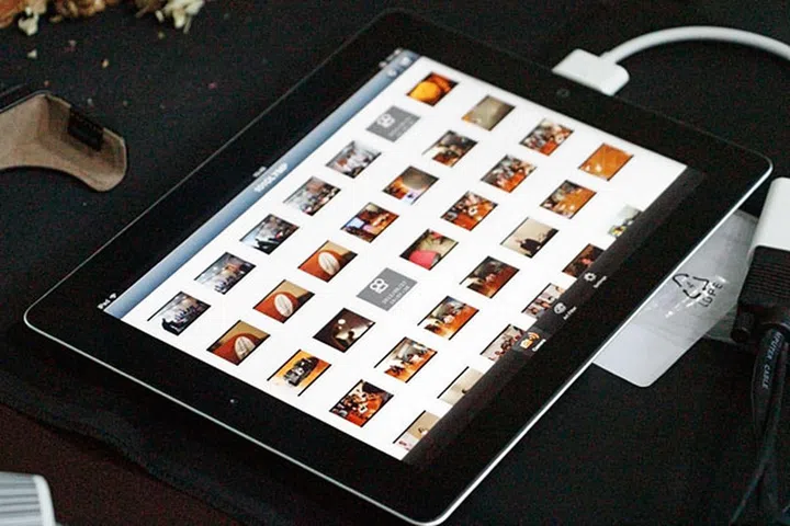 Take images with a paired camera and thumbnails will be automatically pushed to the app. You can then select which full-resolution images you want to download.