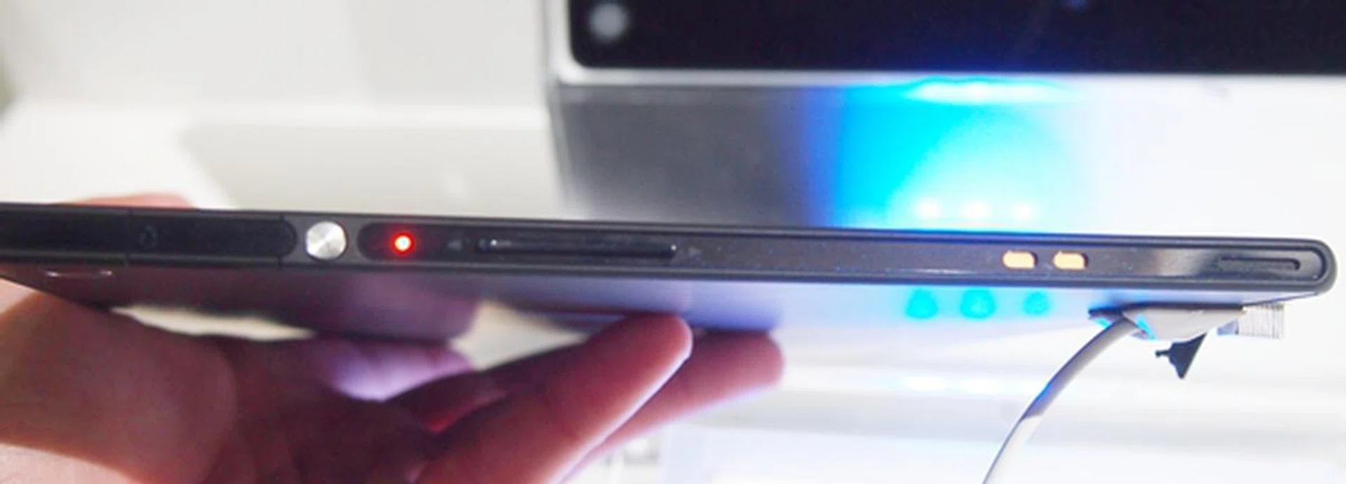 Notice how the side of the Sony Xperia Tablet Z resembles that of the Xperia Z, with the metallic Power button and dock connectors. 
