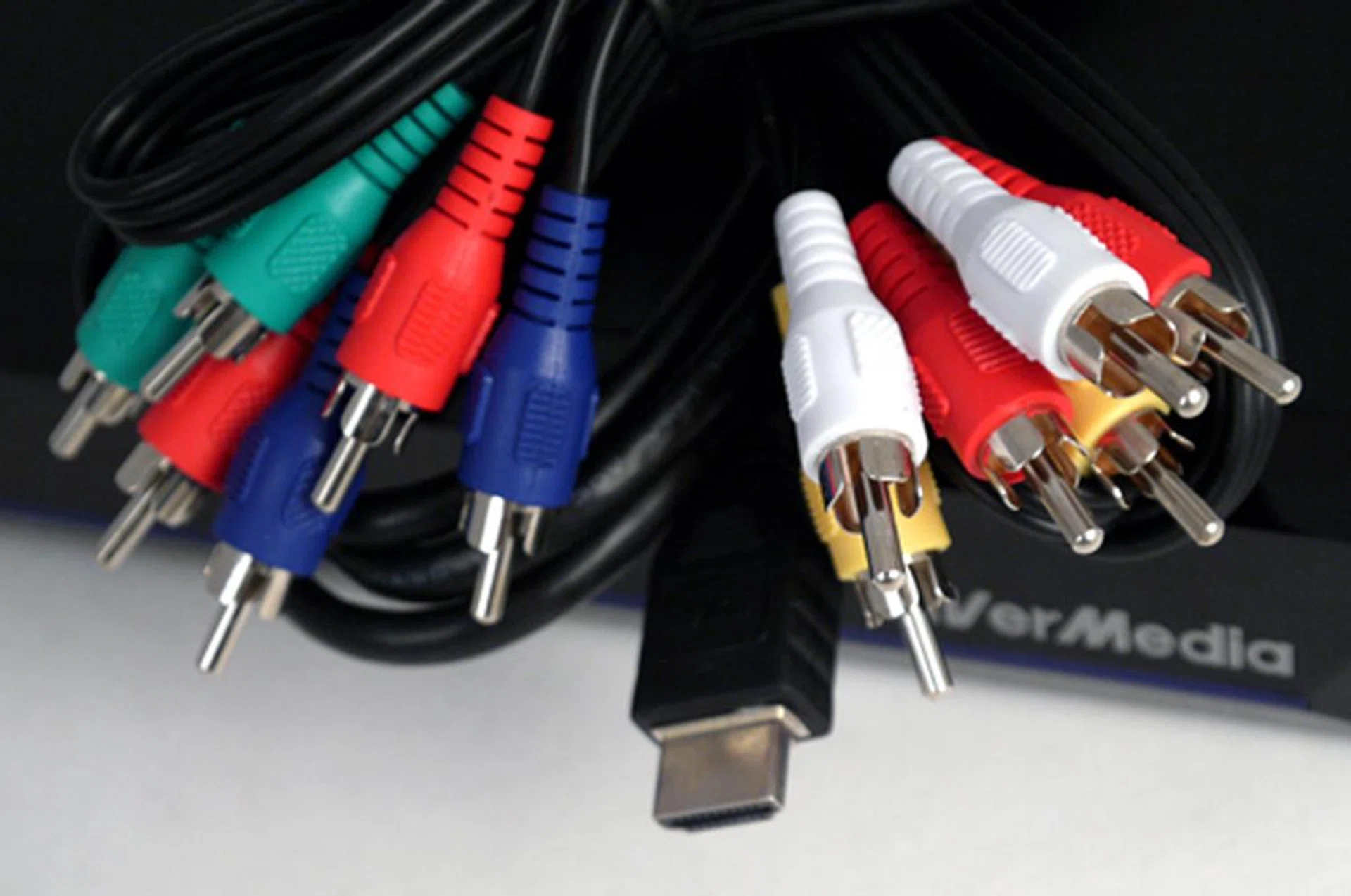 The player's package comes with a standard component, HDMI and composite cables. It doesn't include an Ethernet cable of course.