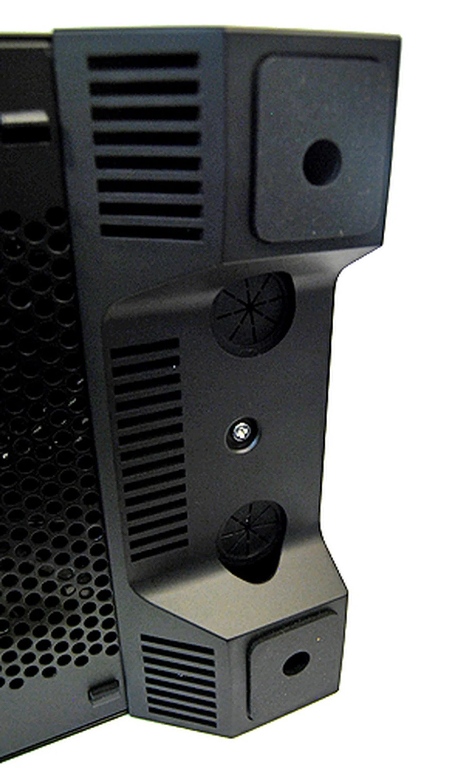 A closer look at the rubber feet. In between the stands are the water-cooling grommets. It's a bit odd for the water-cooling grommets to be located here, since it's a fair distance away from the motherboard.