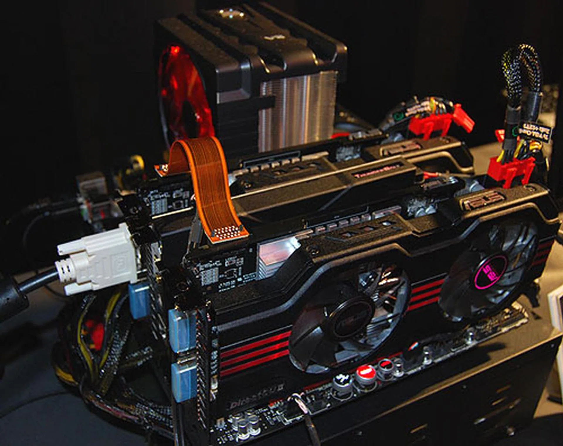 With two dual-slot graphics cards installed, one can barely see the latest ROG motherboard, the Maximus IV Extreme-Z. Notice the 'Z' suffix to represent its Z68 chipset. If Intel keeps releasing new chipsets every six months, ASUS will run out of names for its Intel based ROG boards. 