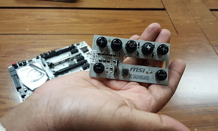 The OC Dashboard plugs directly into the board to offer overclockers more tactile control over their overlocks. It can also be connected to the board via an extension cable.