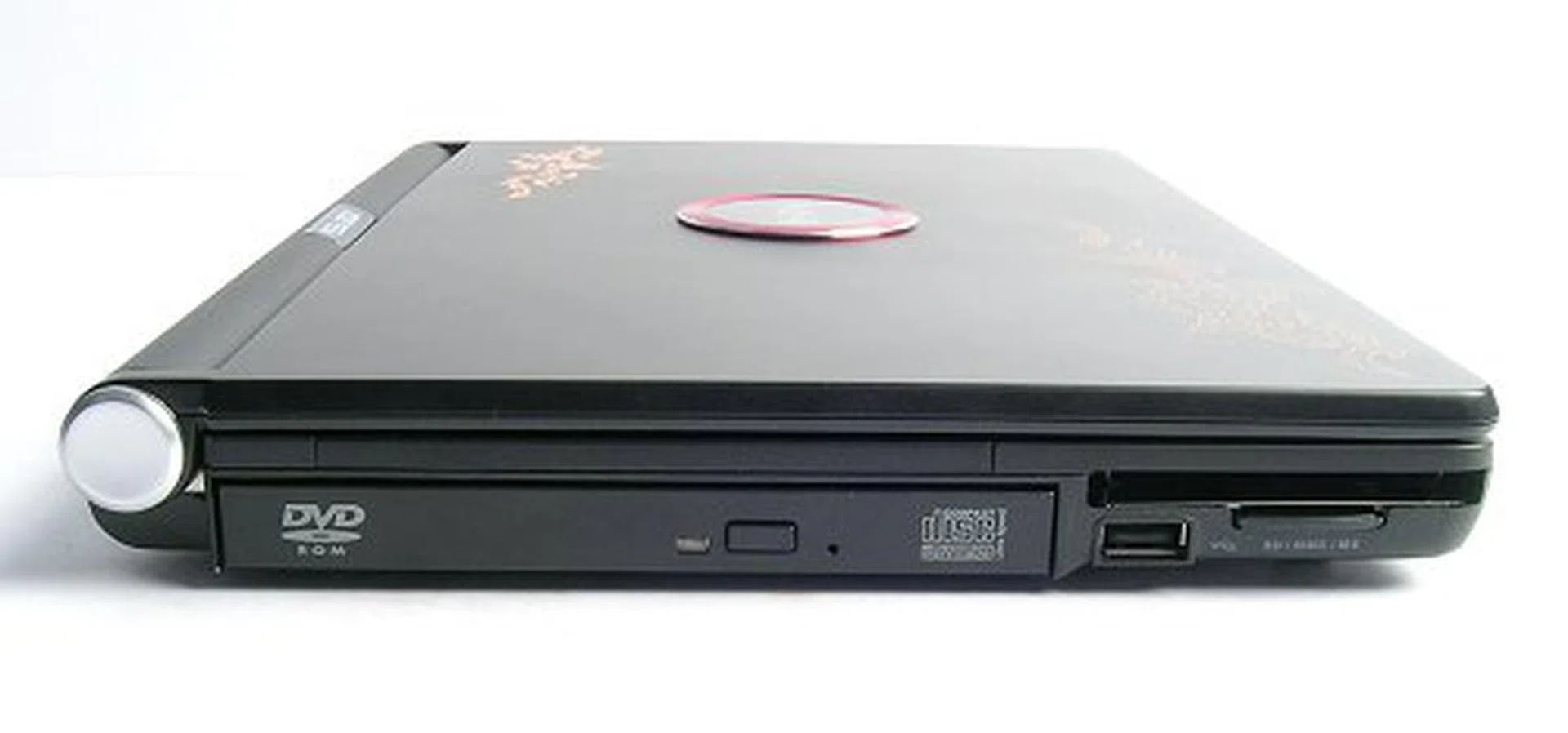 Left Face – (left to right: Combo Drive, USB 2.0 port, PCMCIA slot and 3-in-1 card reader.)

